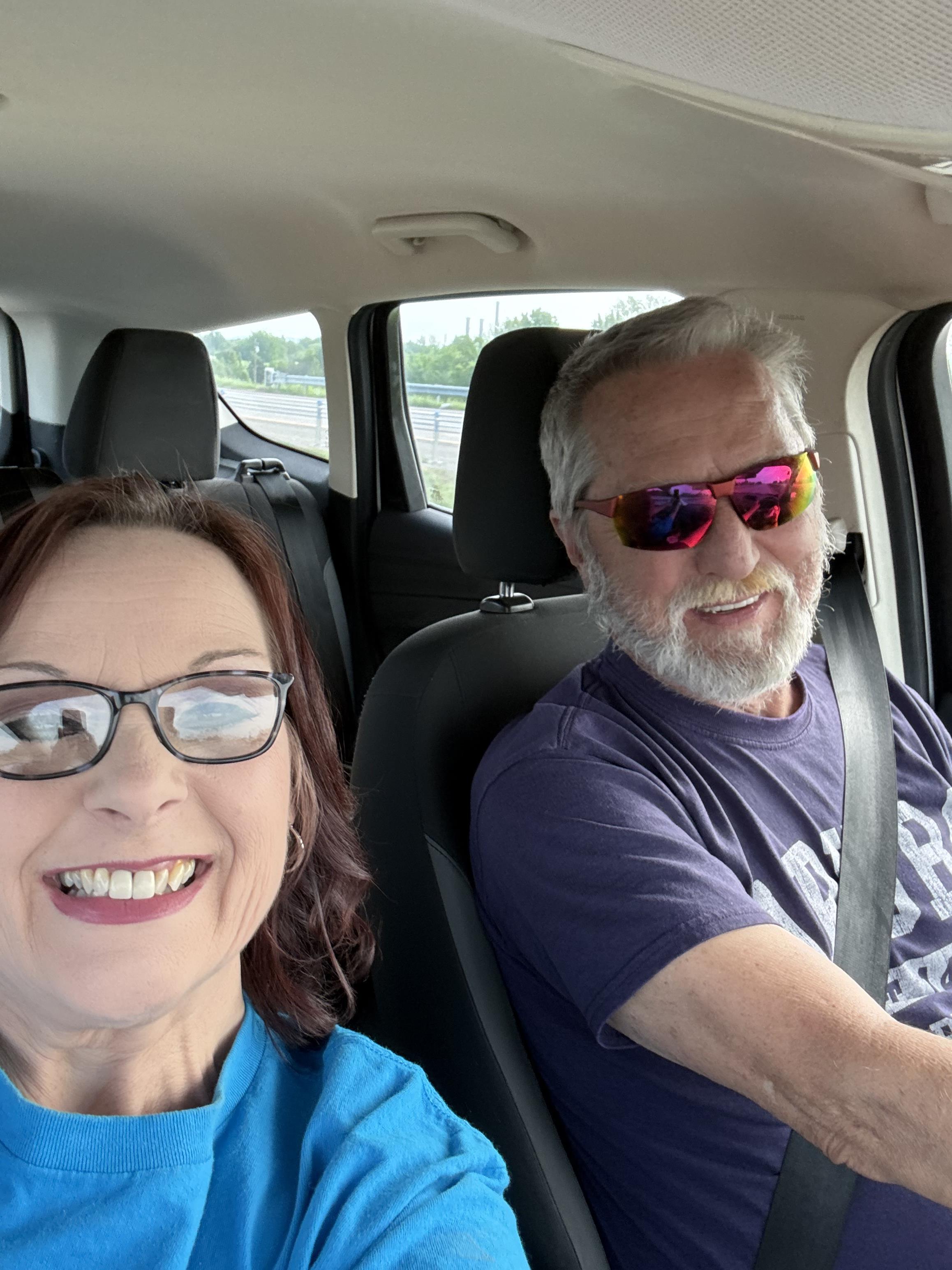 A man and woman in a car