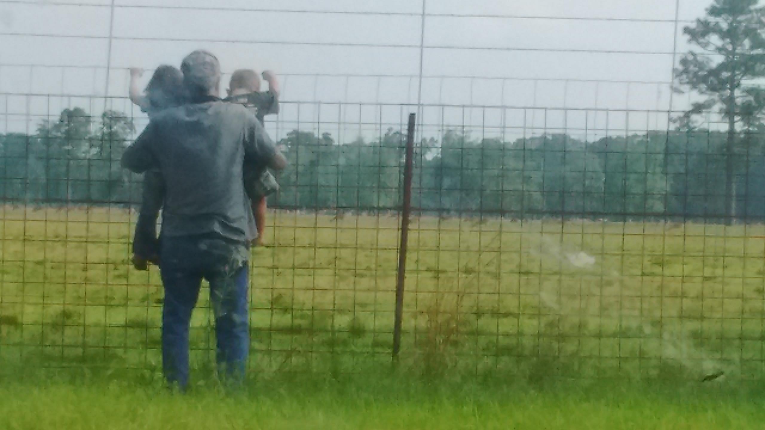 A group of people standing in a field