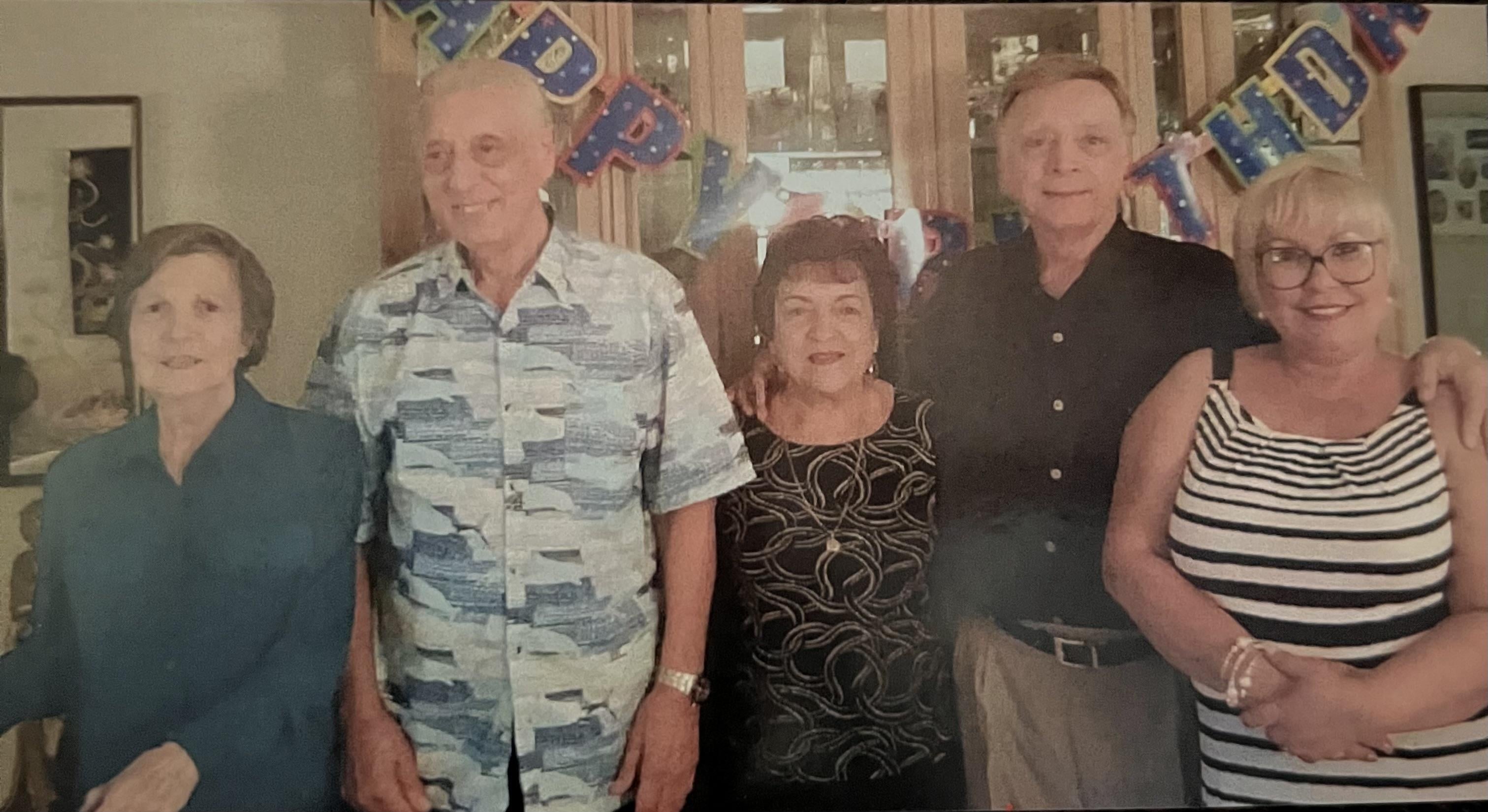 A group of people posing for a photo