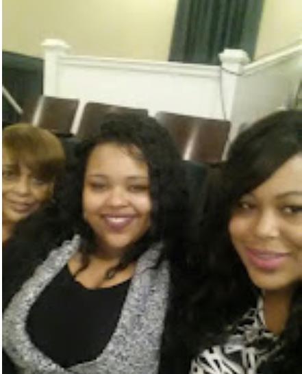 A group of women smiling for a selfie