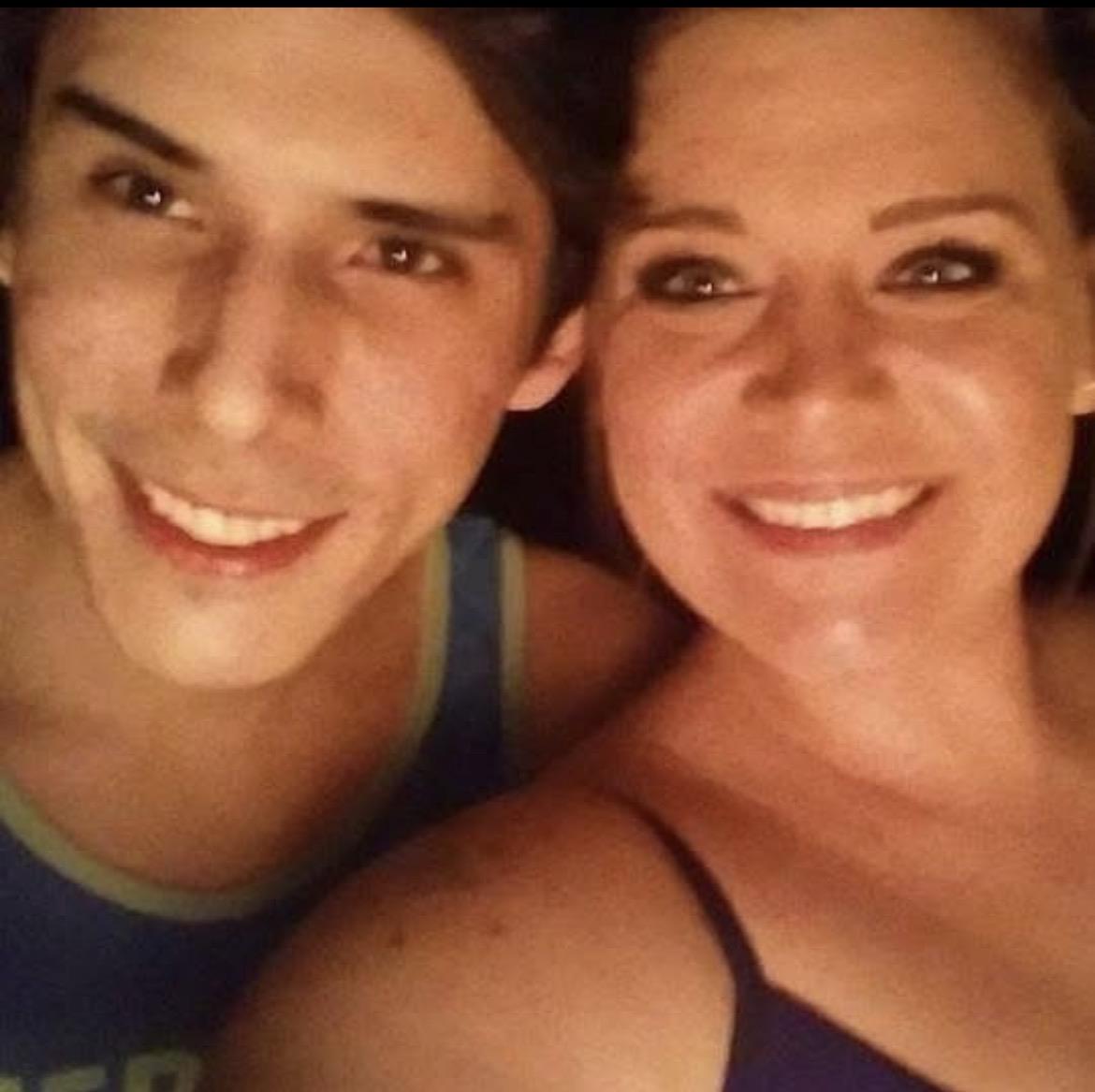 A man and woman taking a selfie