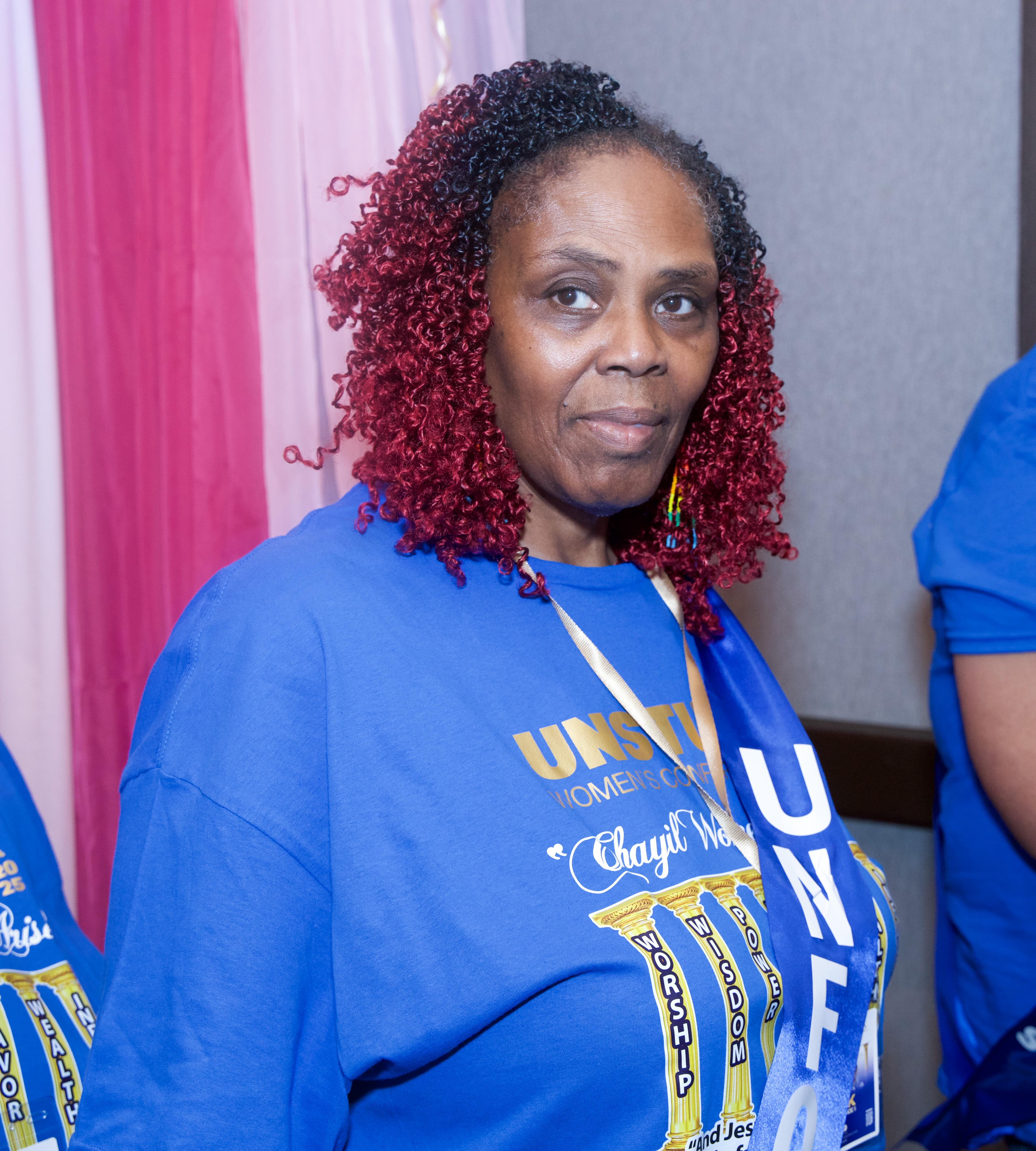 A woman wearing a blue shirt