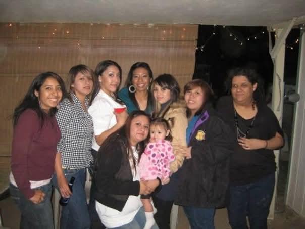 A group of women posing for a photo