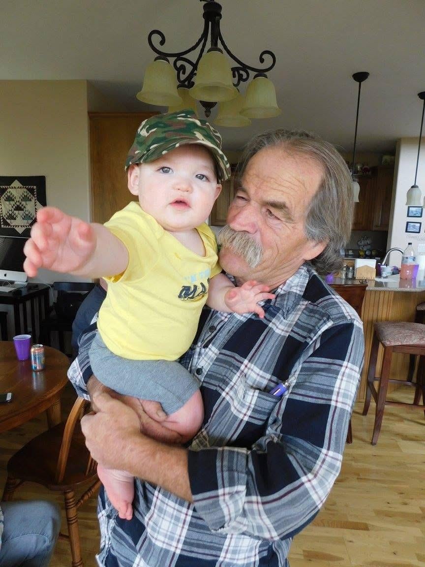A man holding a baby