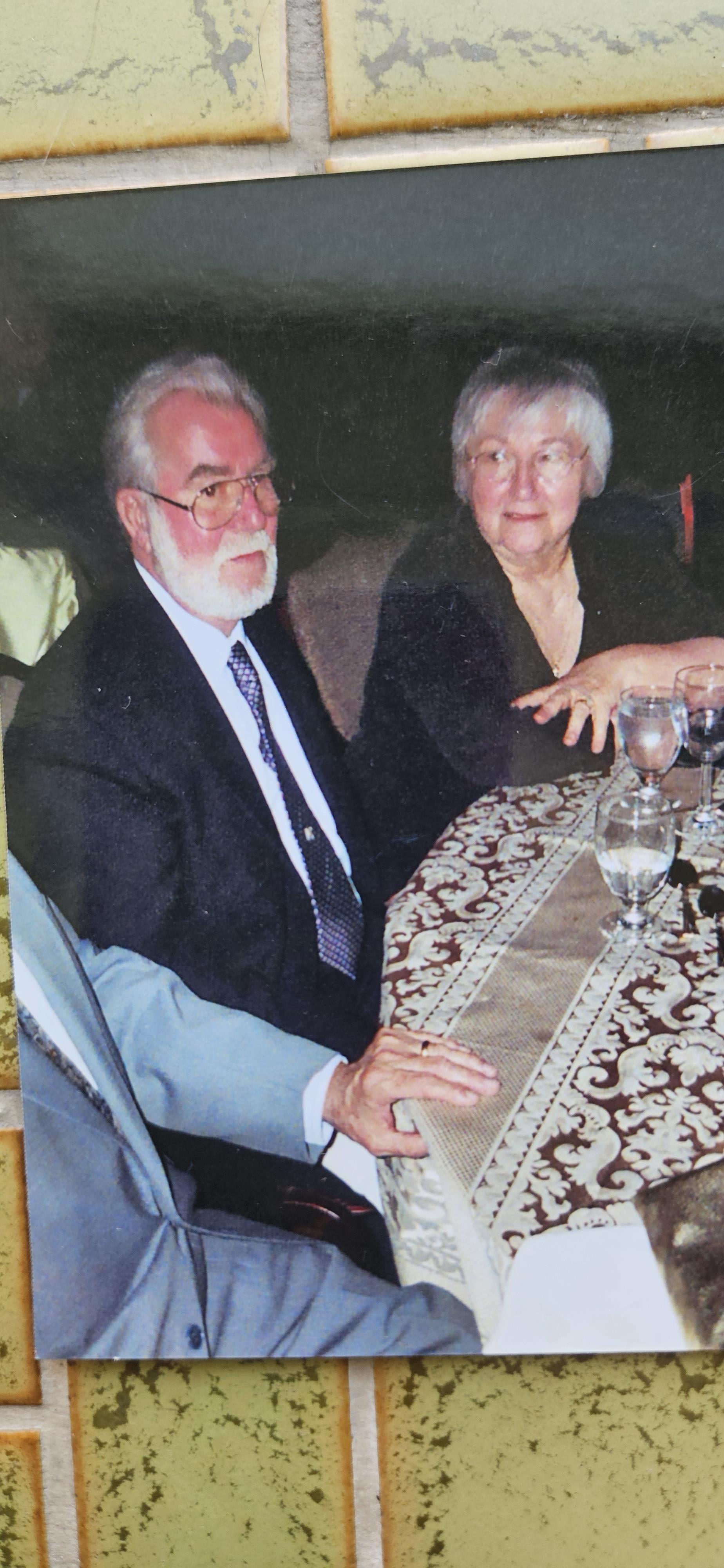 A man and woman sitting at a table