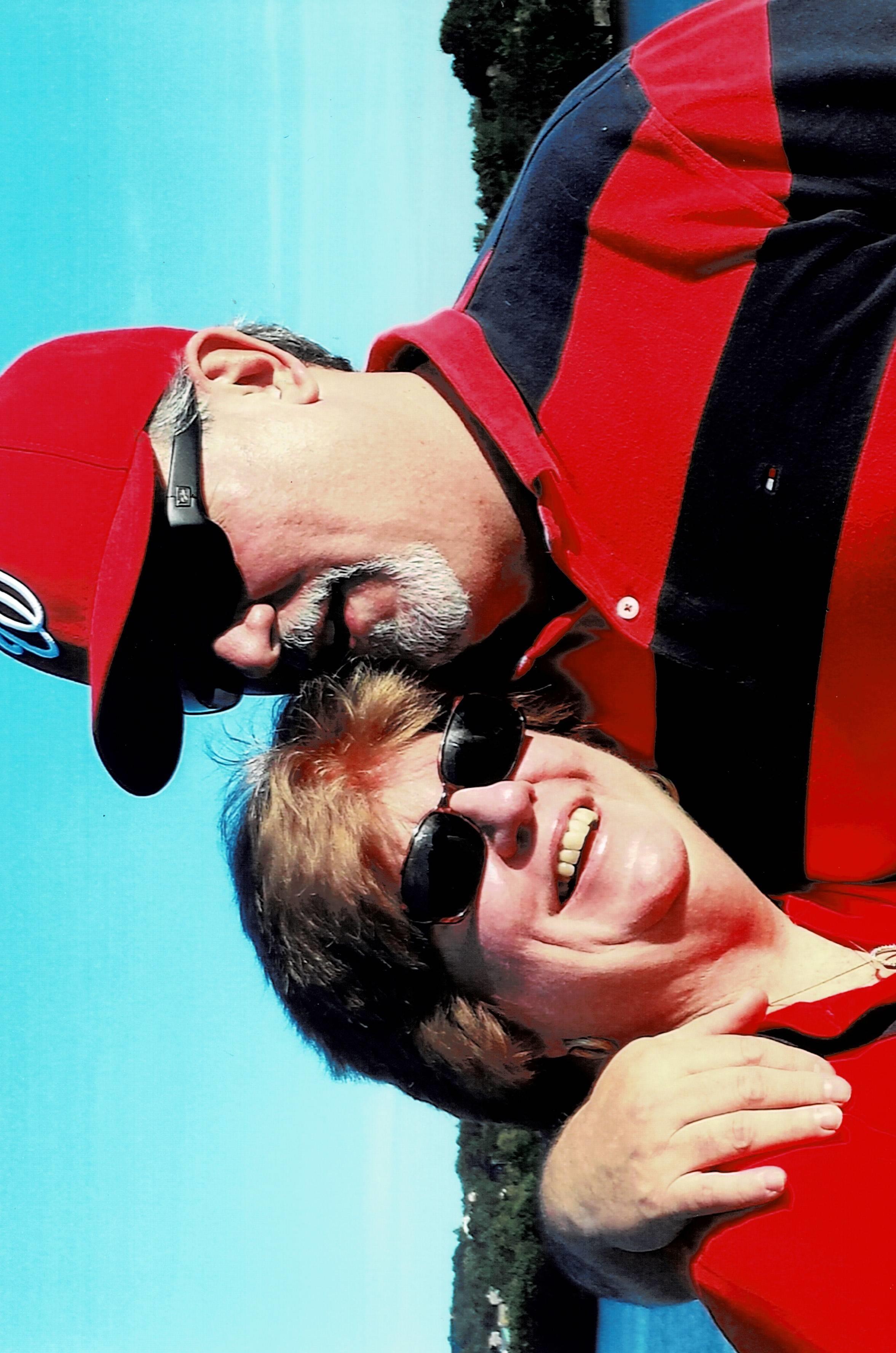 A man and woman smiling