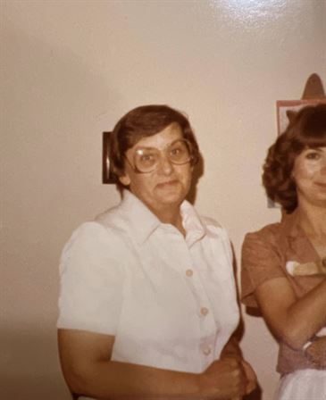 A woman in a white shirt