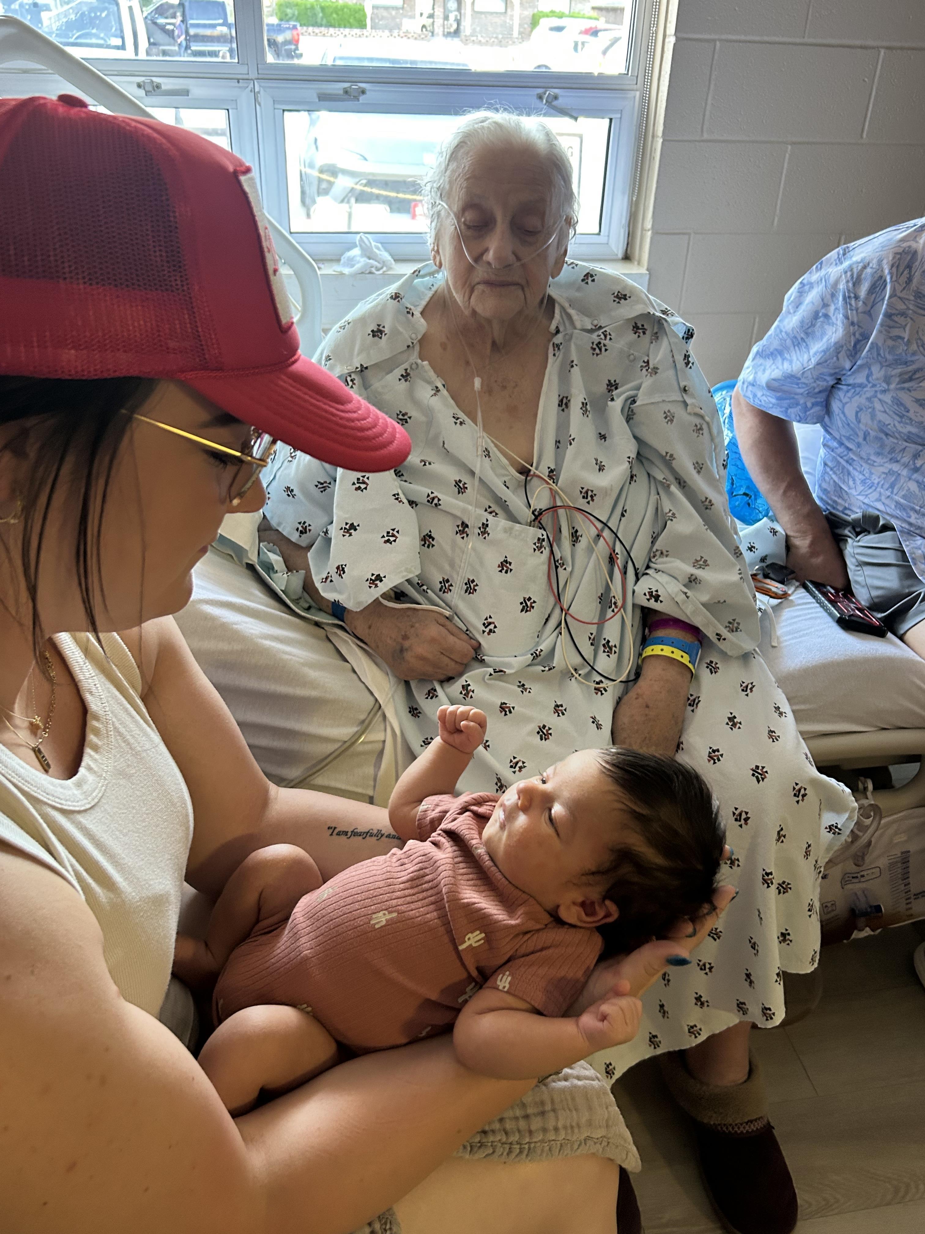 A woman holding a baby