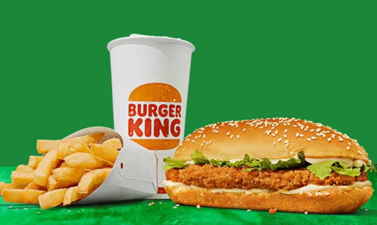 A burger and fries with a drink