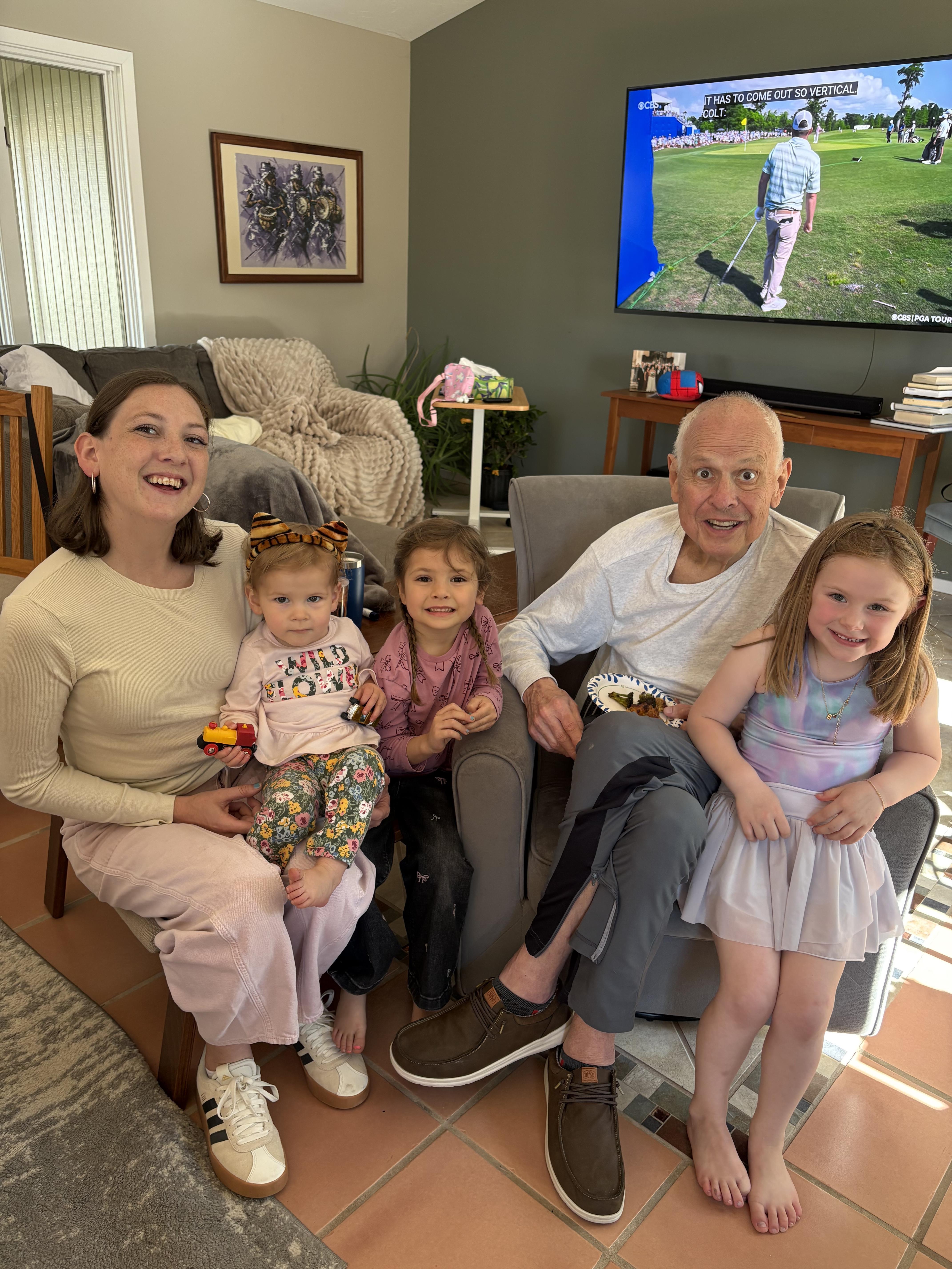 A group of people sitting on a couch