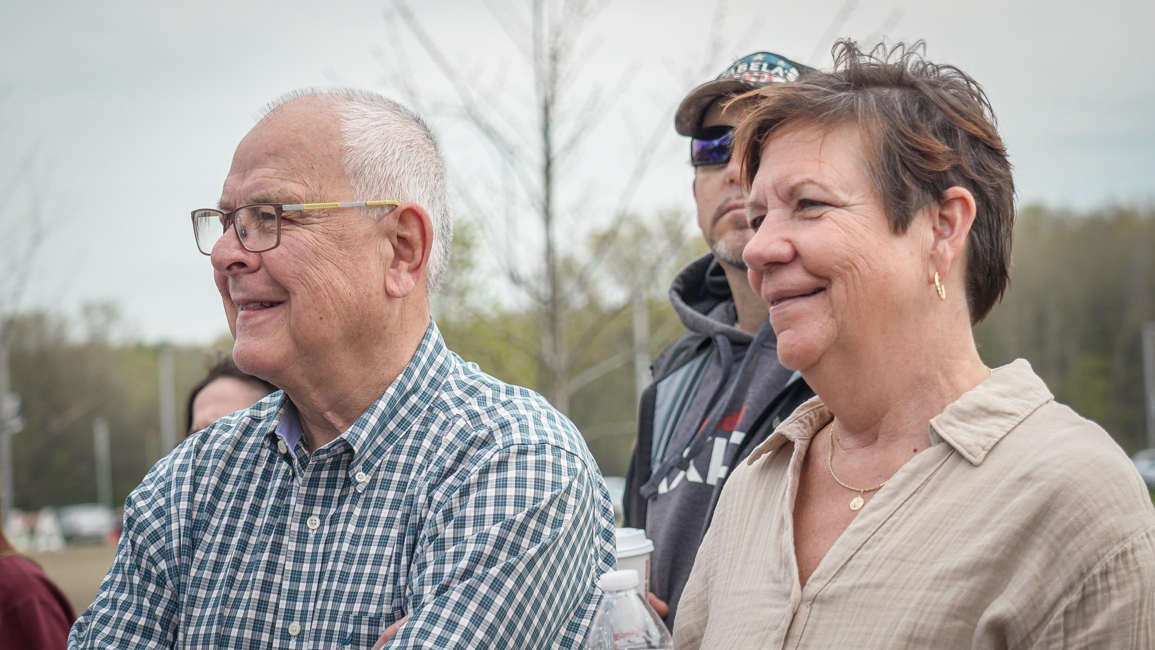 A group of people smiling
