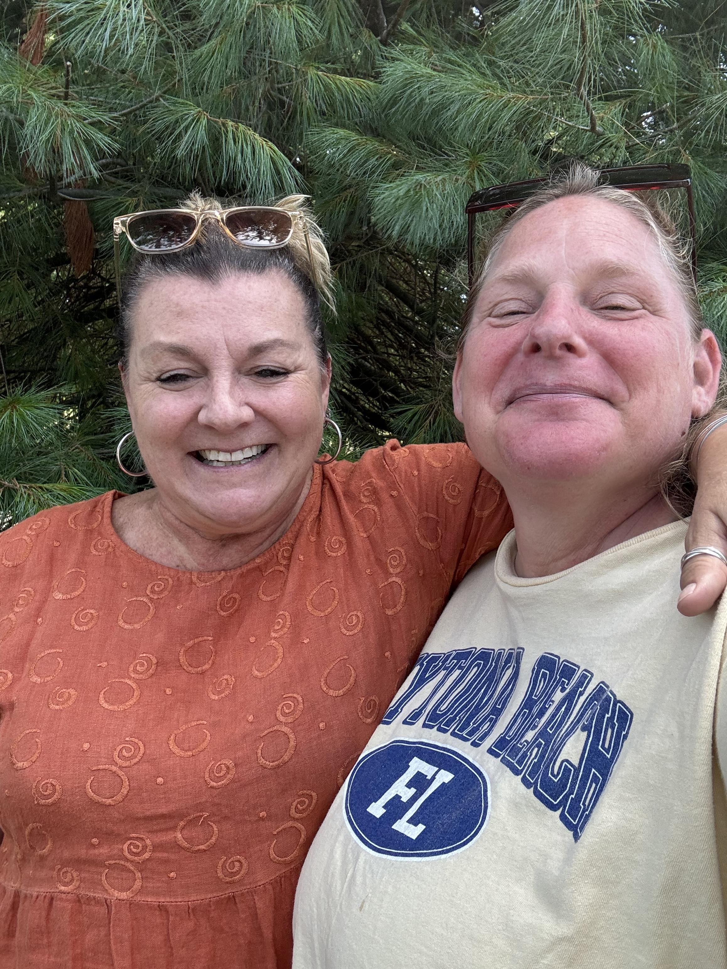 Two women smiling at the camera
