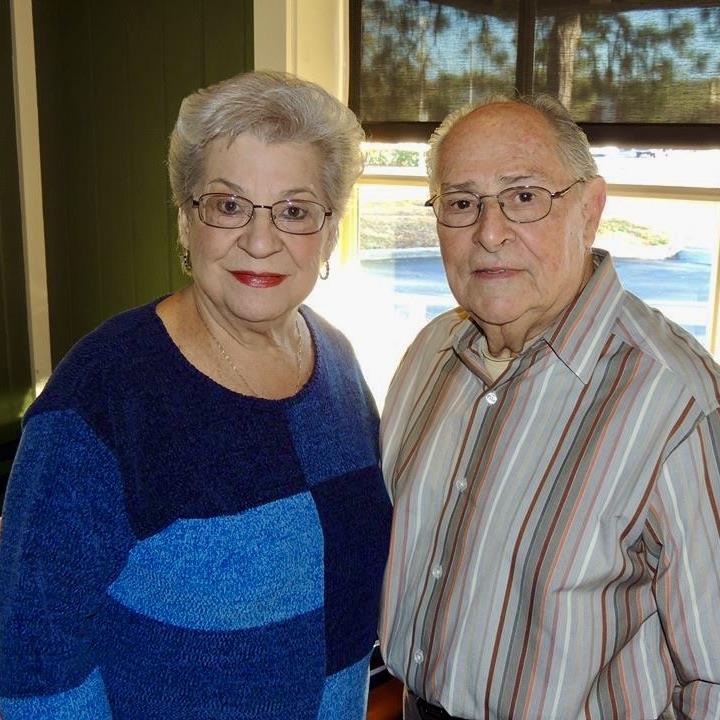 A man and woman standing next to each other