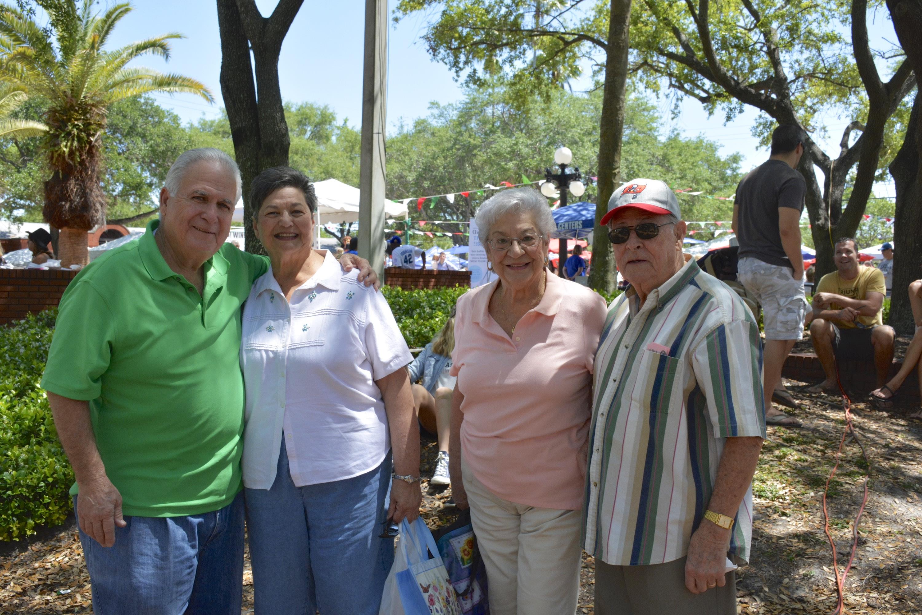 A group of old people posing for a photo