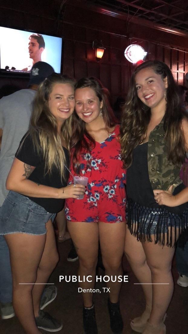 A group of women posing for a photo