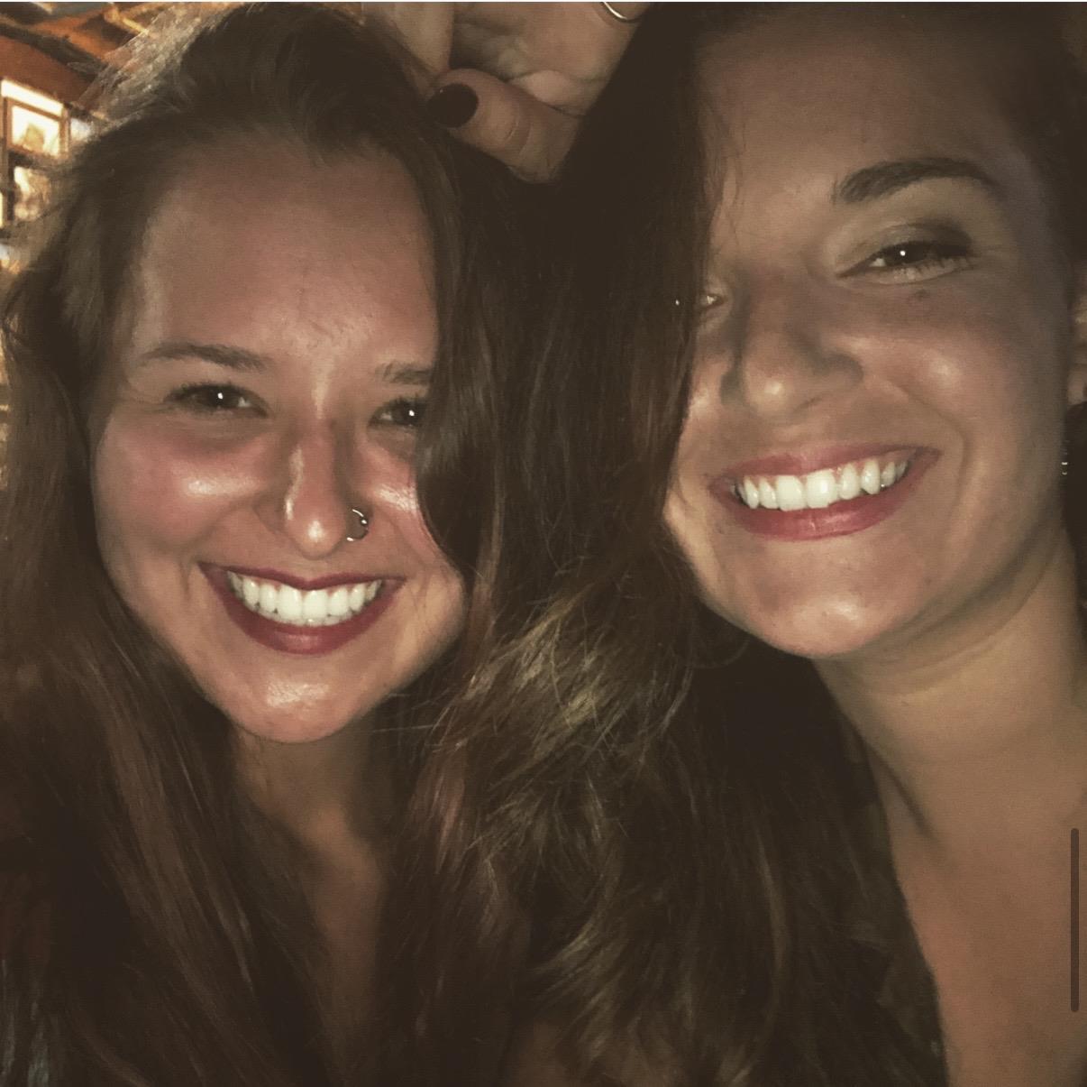 Two women smiling at the camera