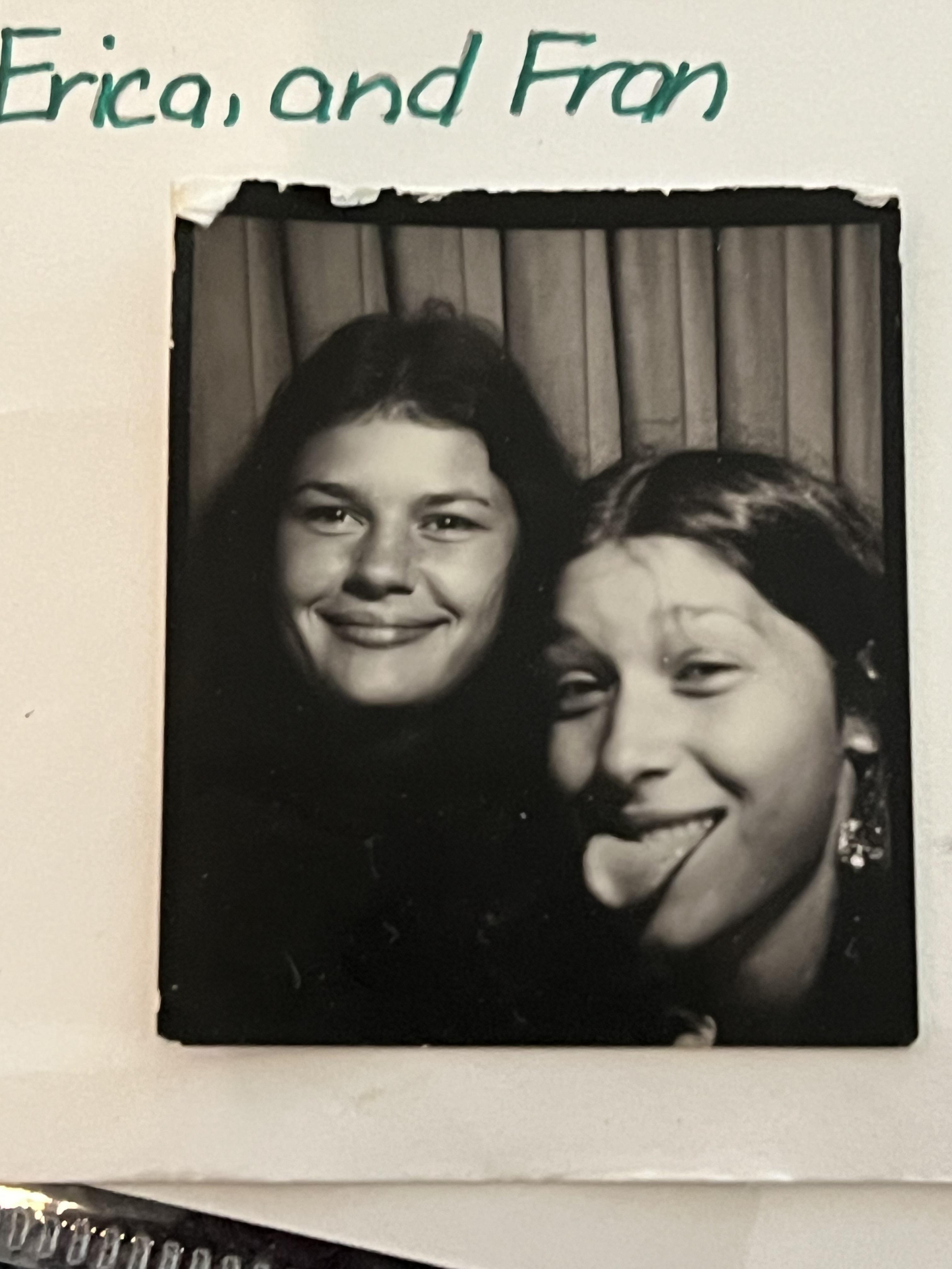 A black and white photo of two women