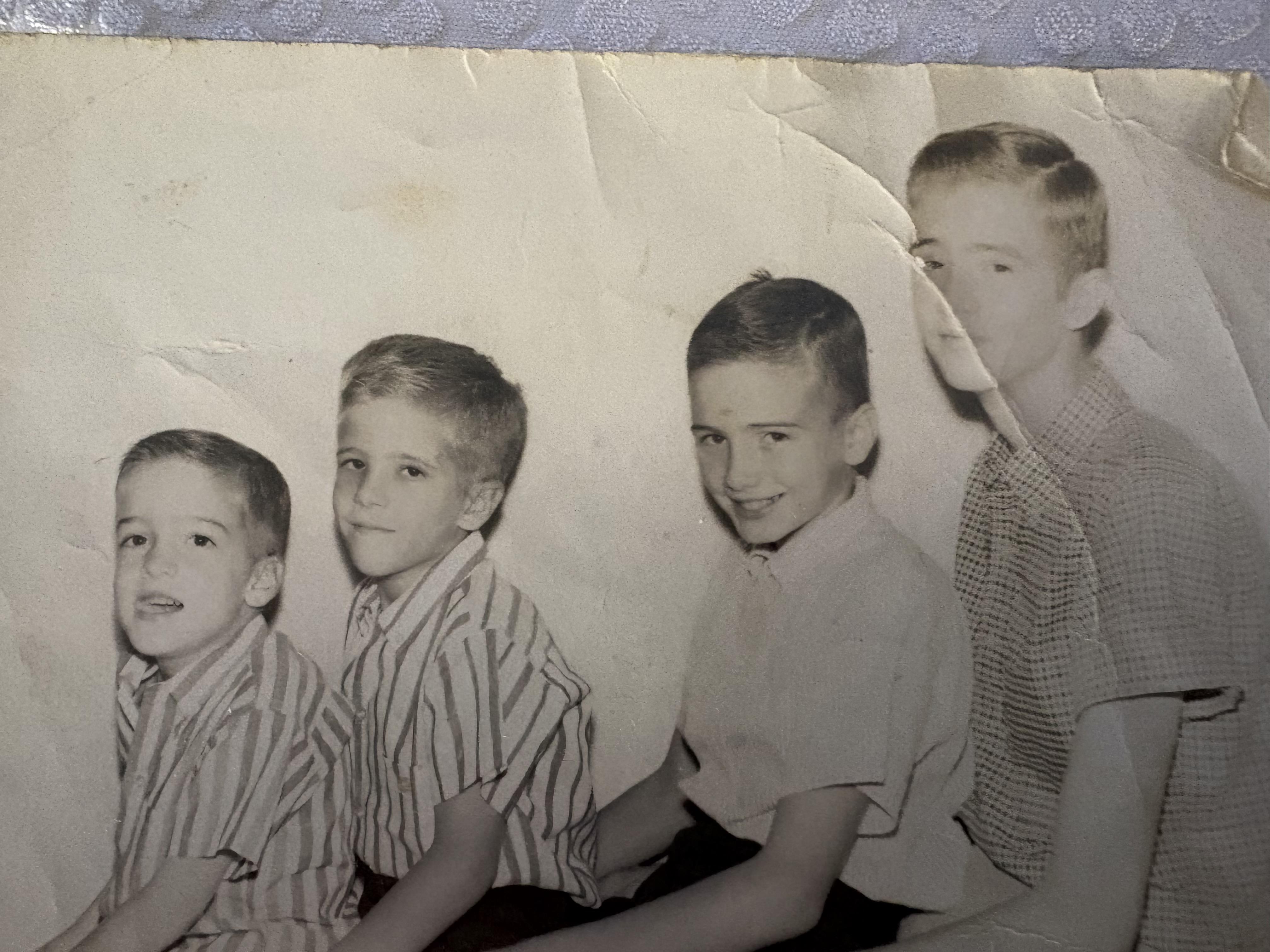 A group of boys sitting together