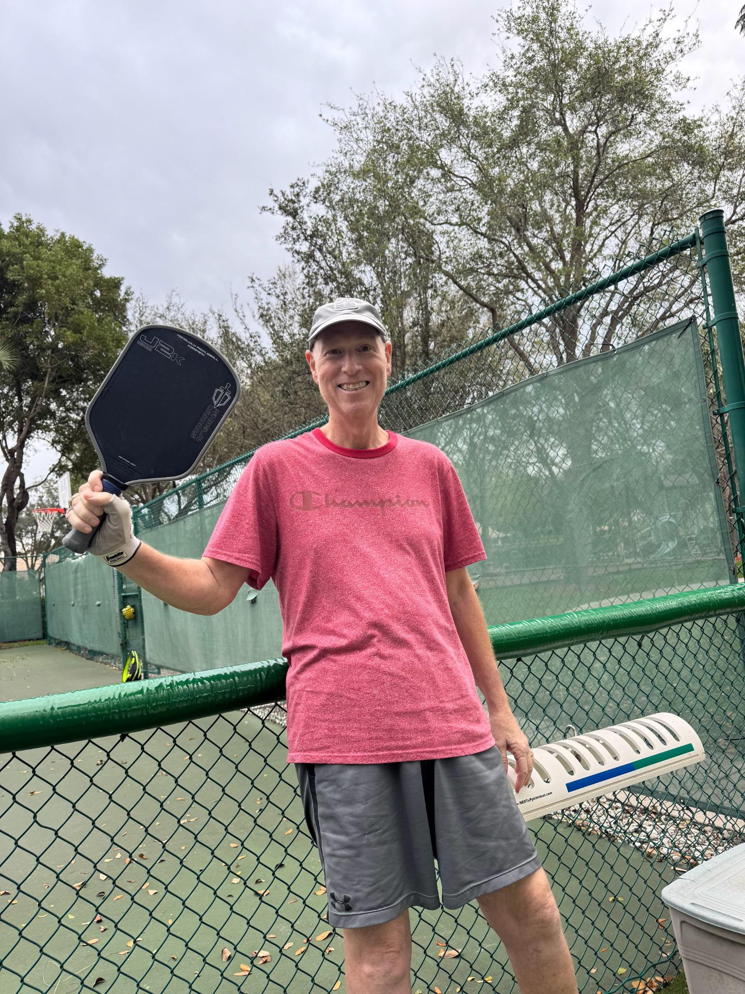 A man holding a paddle