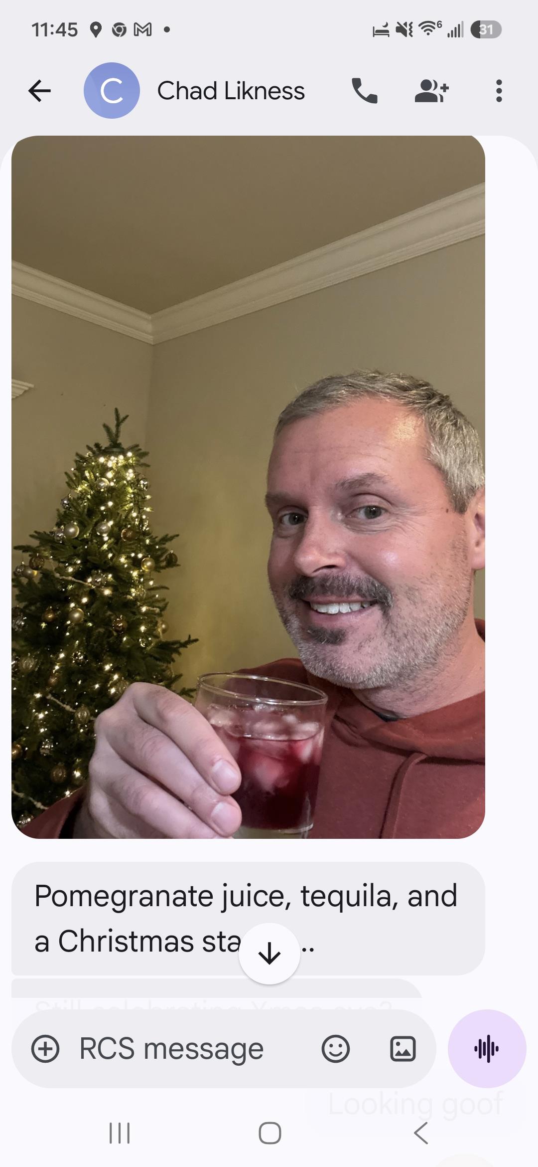 A man holding a drink