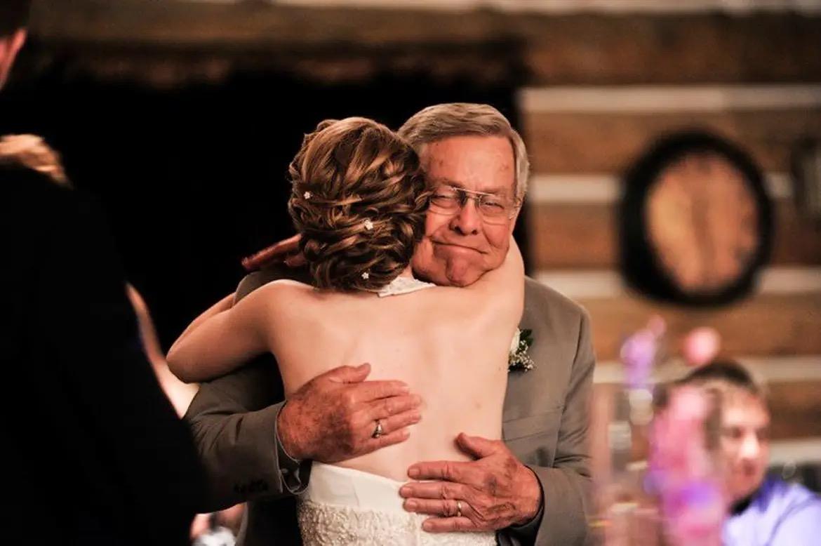 A man hugging a woman