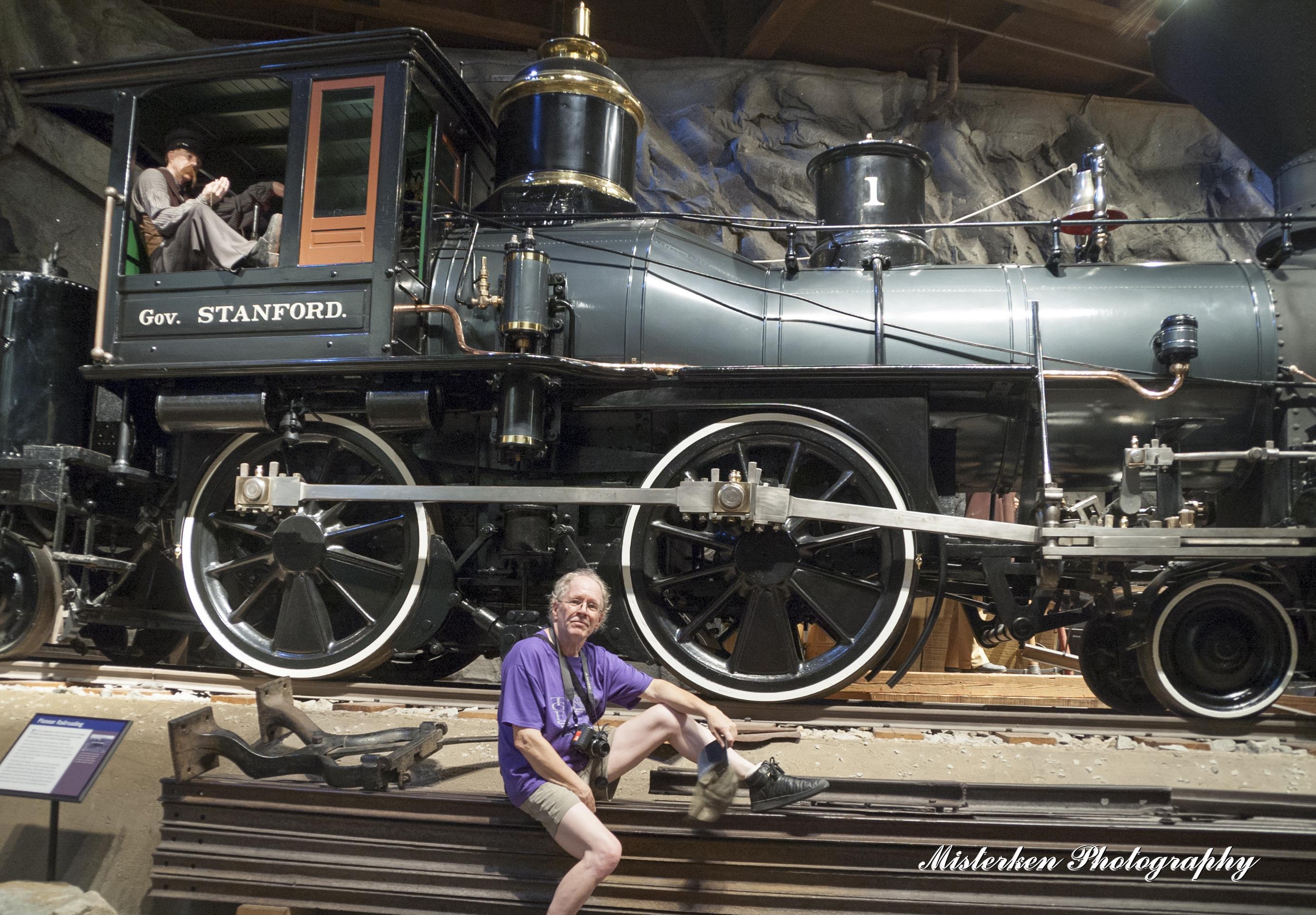 A man sitting on a train