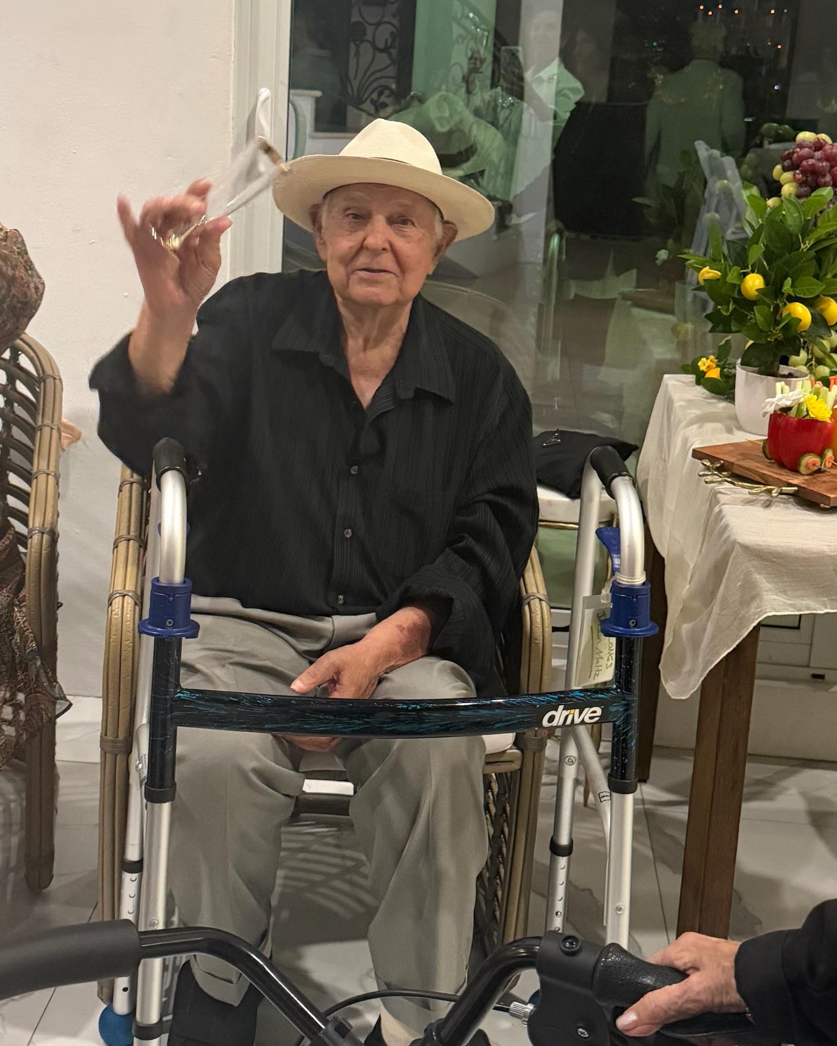 An old man in a wheelchair