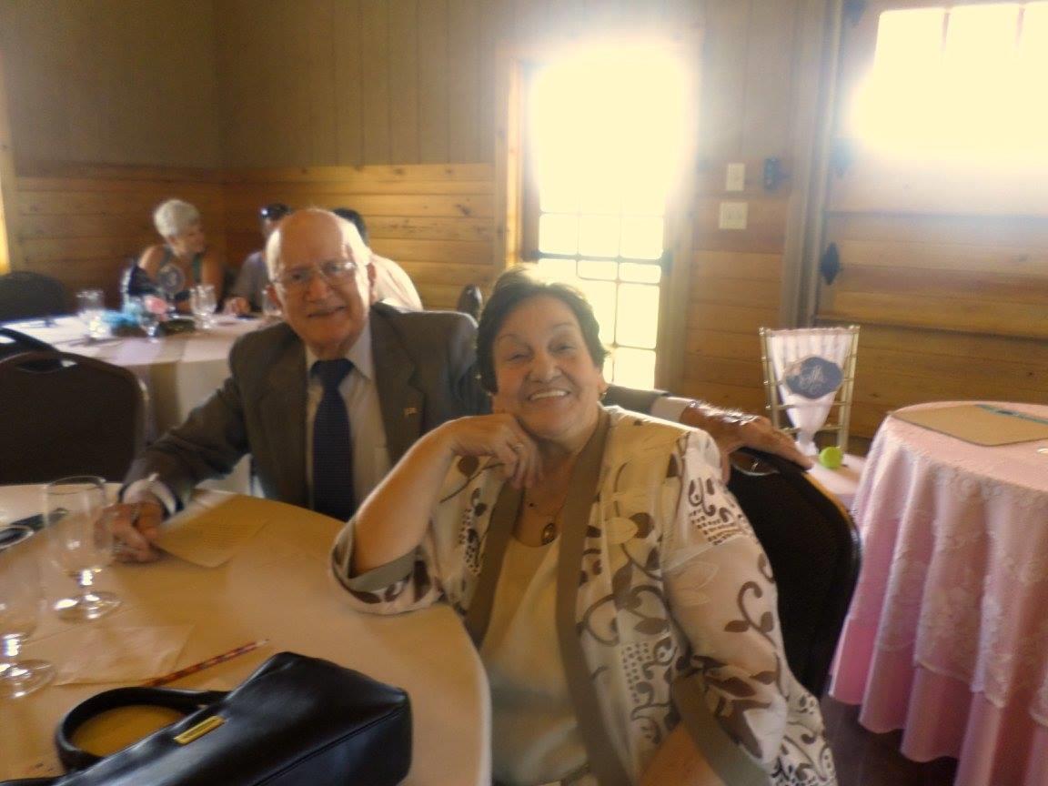 A man and woman sitting at a table