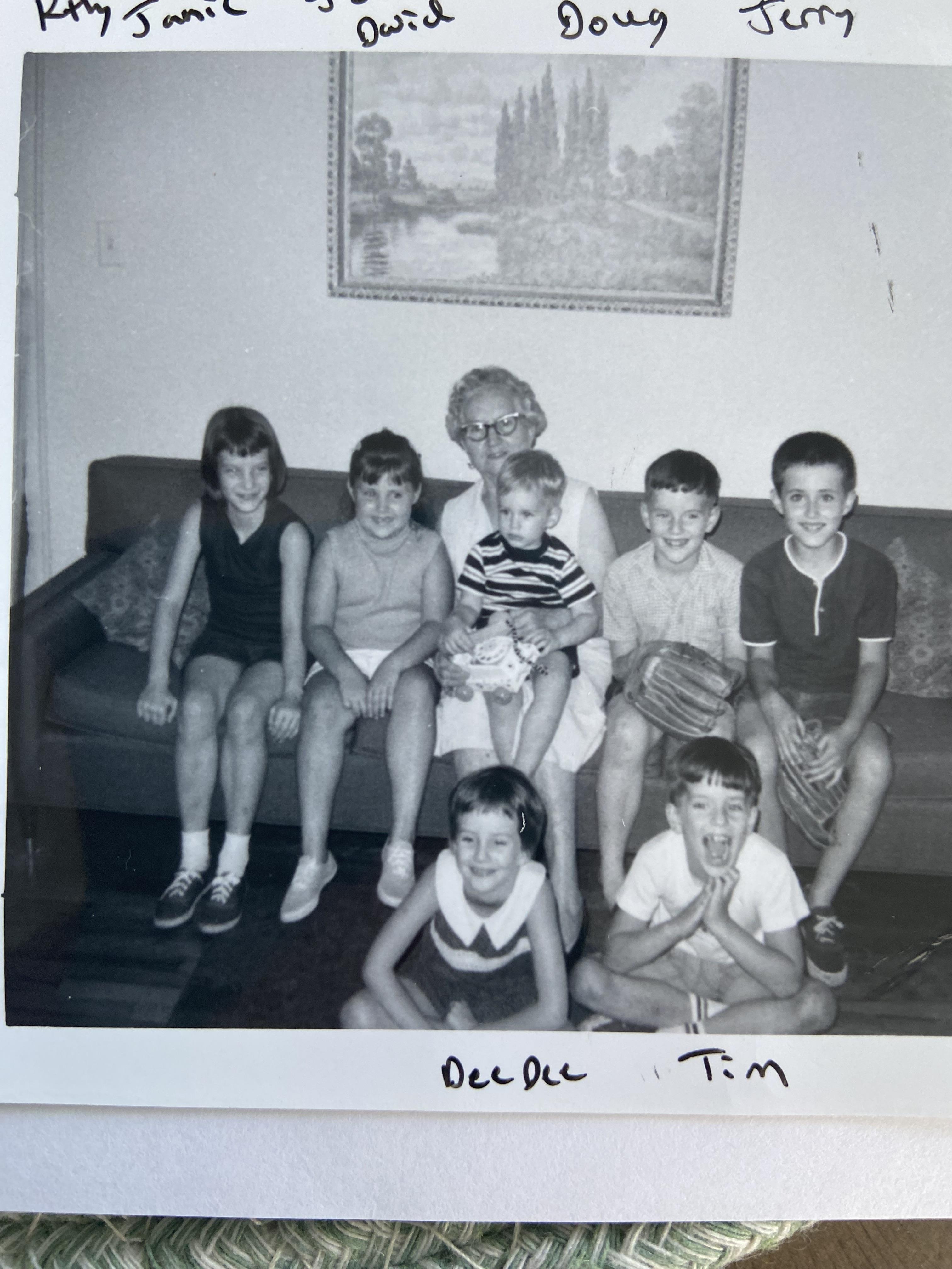 A group of children sitting on a couch