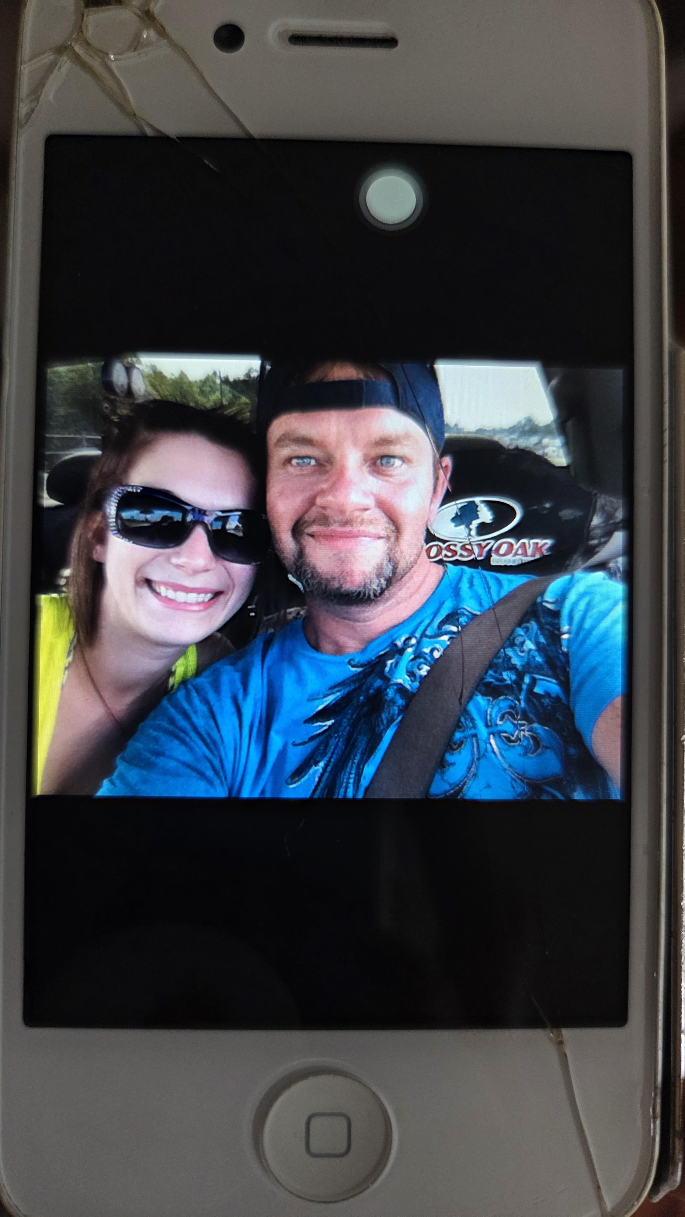 A man and woman taking a selfie
