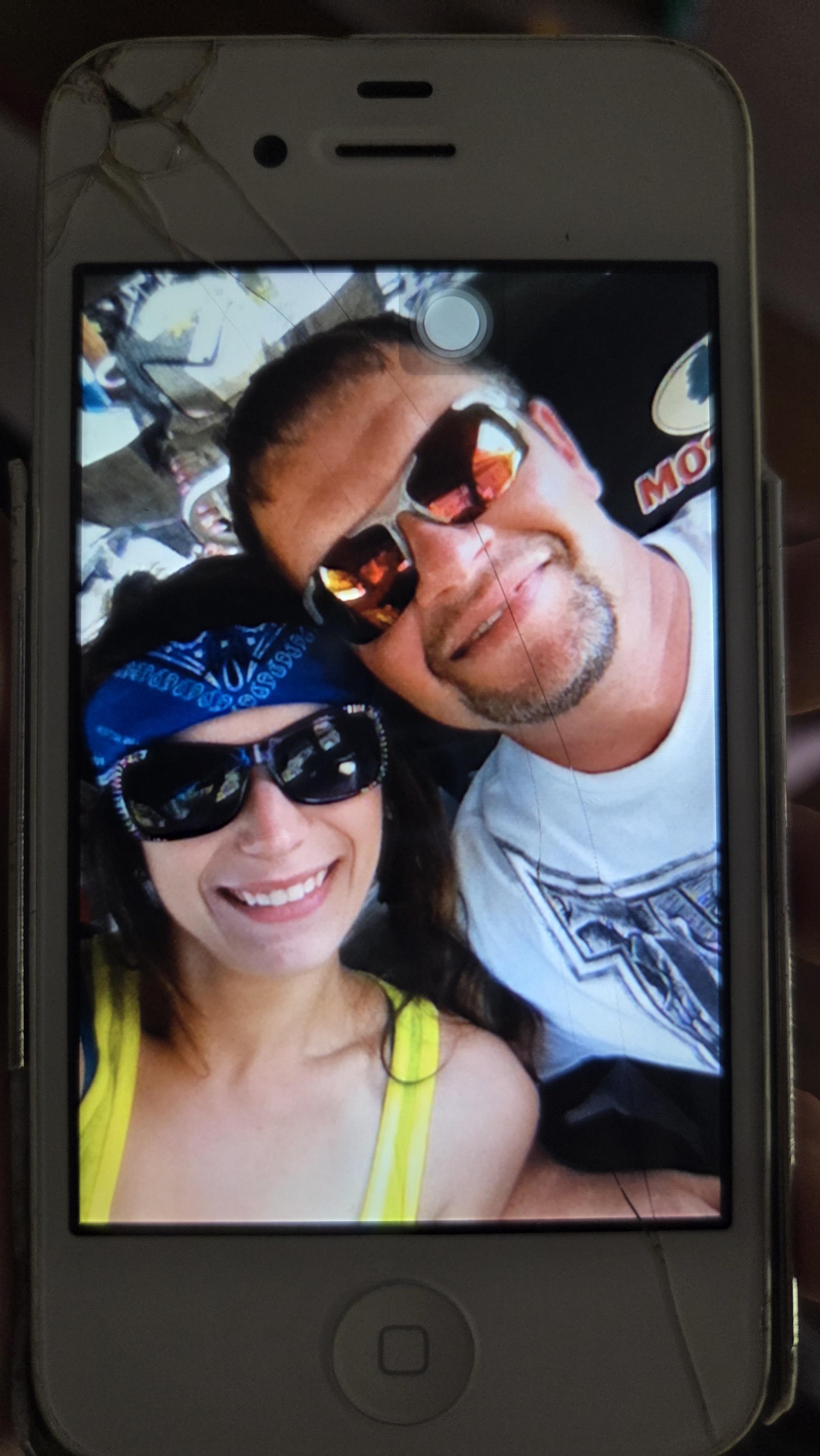 A man and woman taking a selfie
