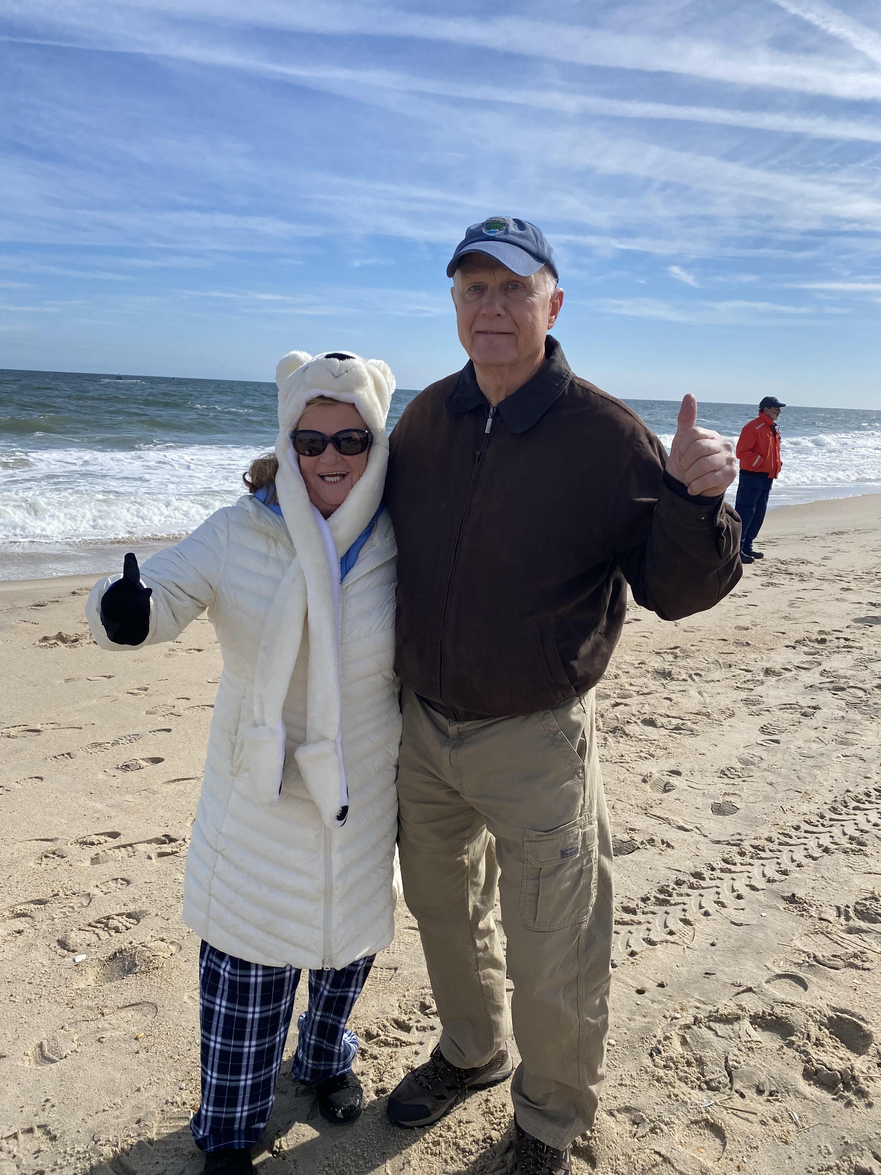 A man and woman on a beach