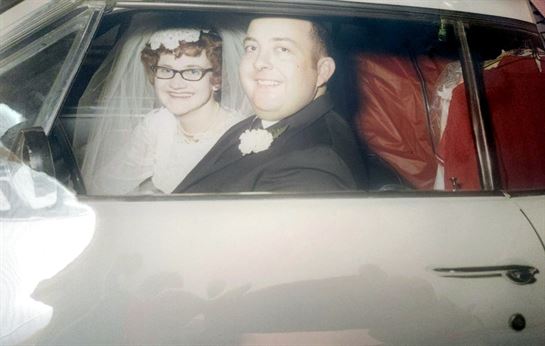 A man and woman in a car