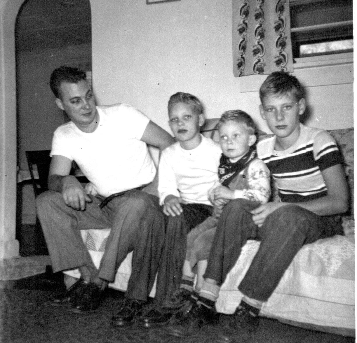 A group of people sitting on a couch