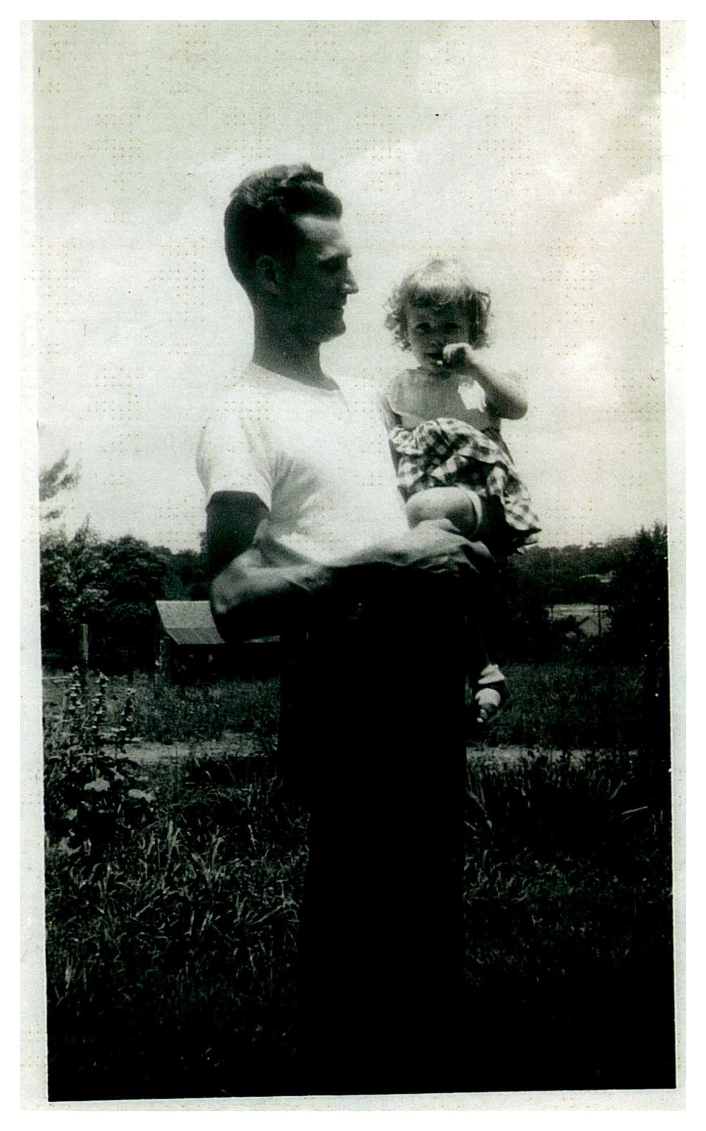A man holding a baby