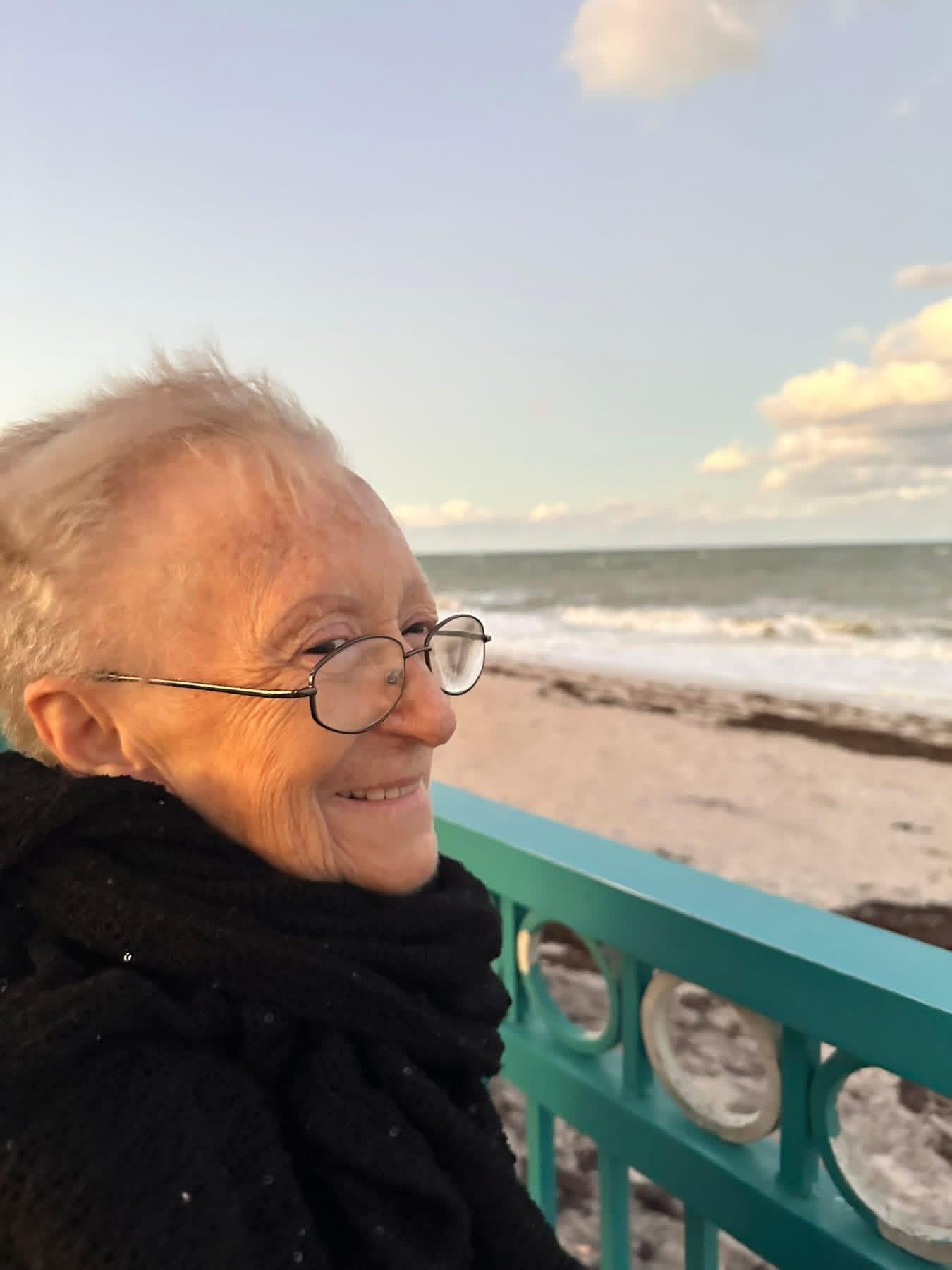 A woman smiling at the camera