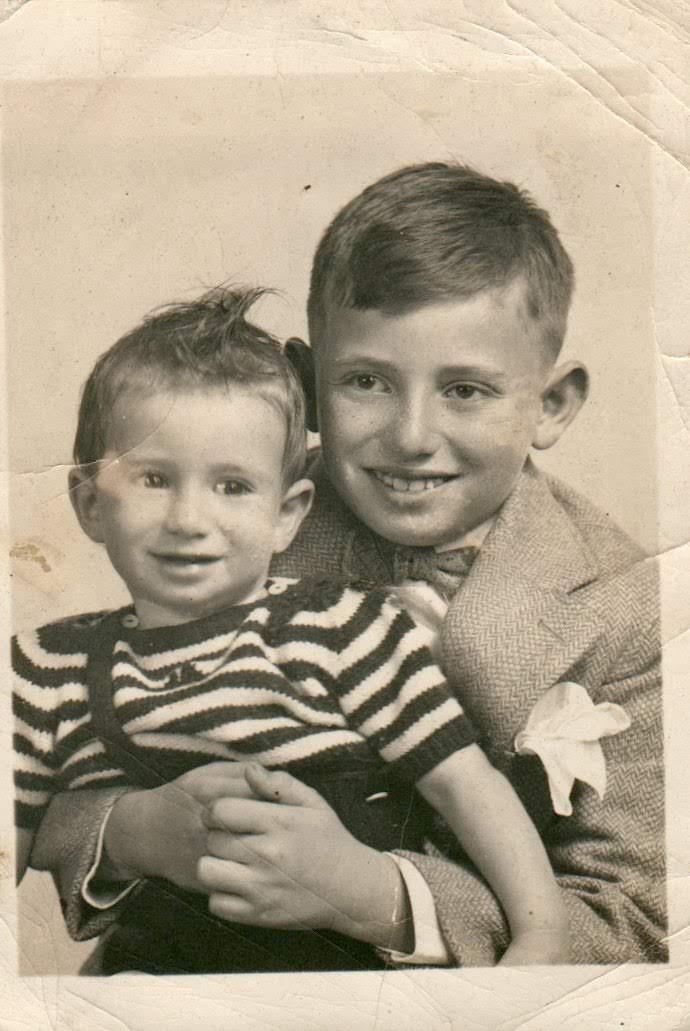 A black and white photo of two boys