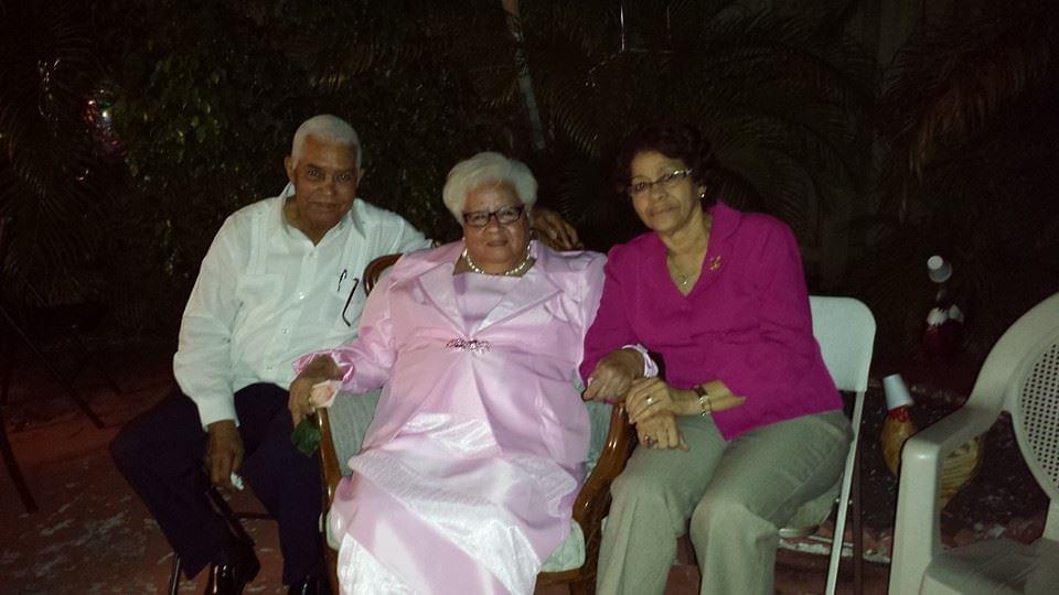 A group of people sitting on a bench