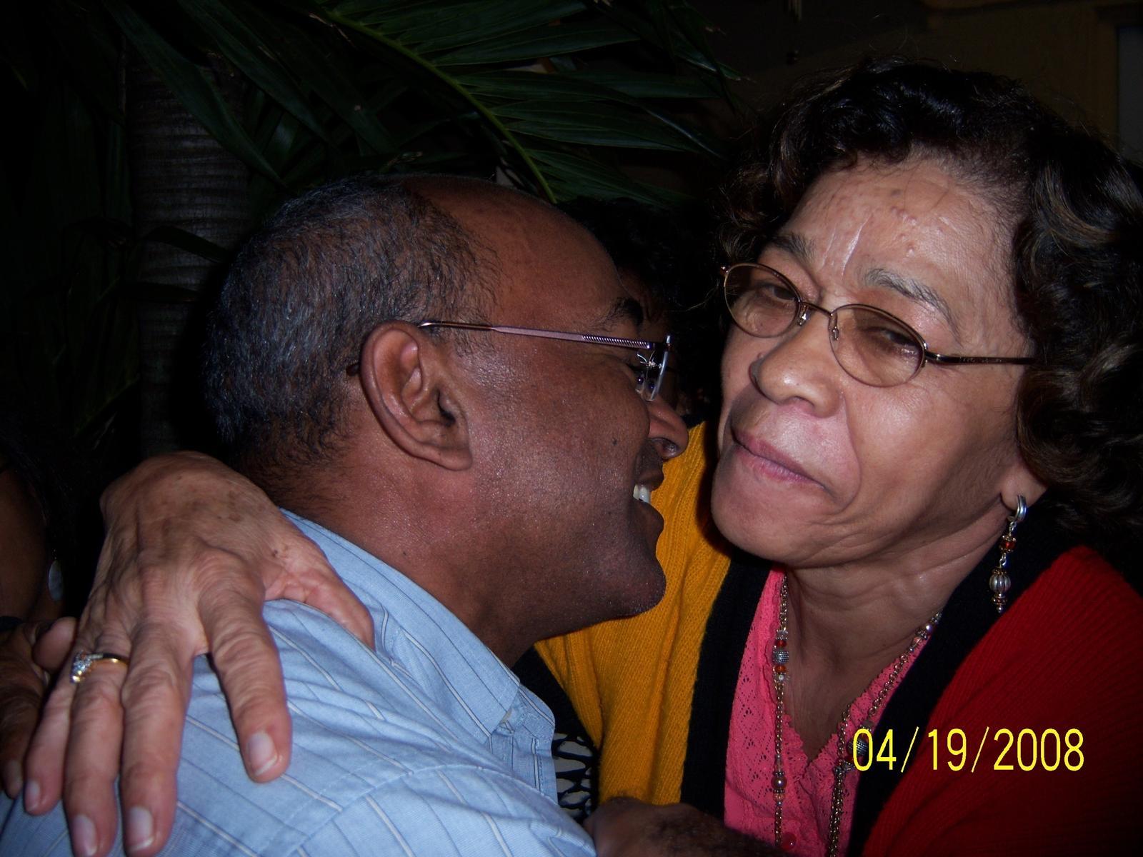 A man and woman smiling