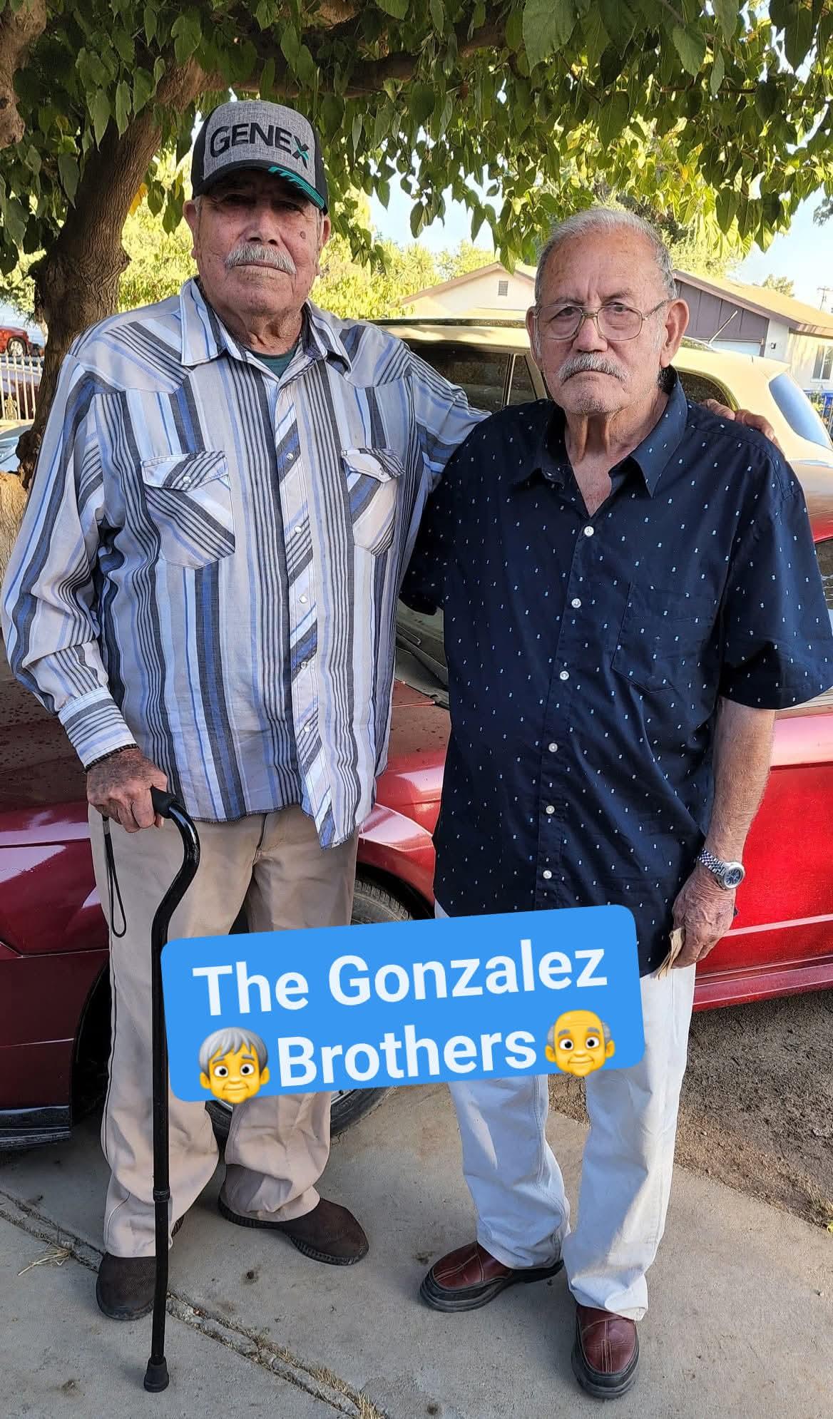 Two men standing next to each other