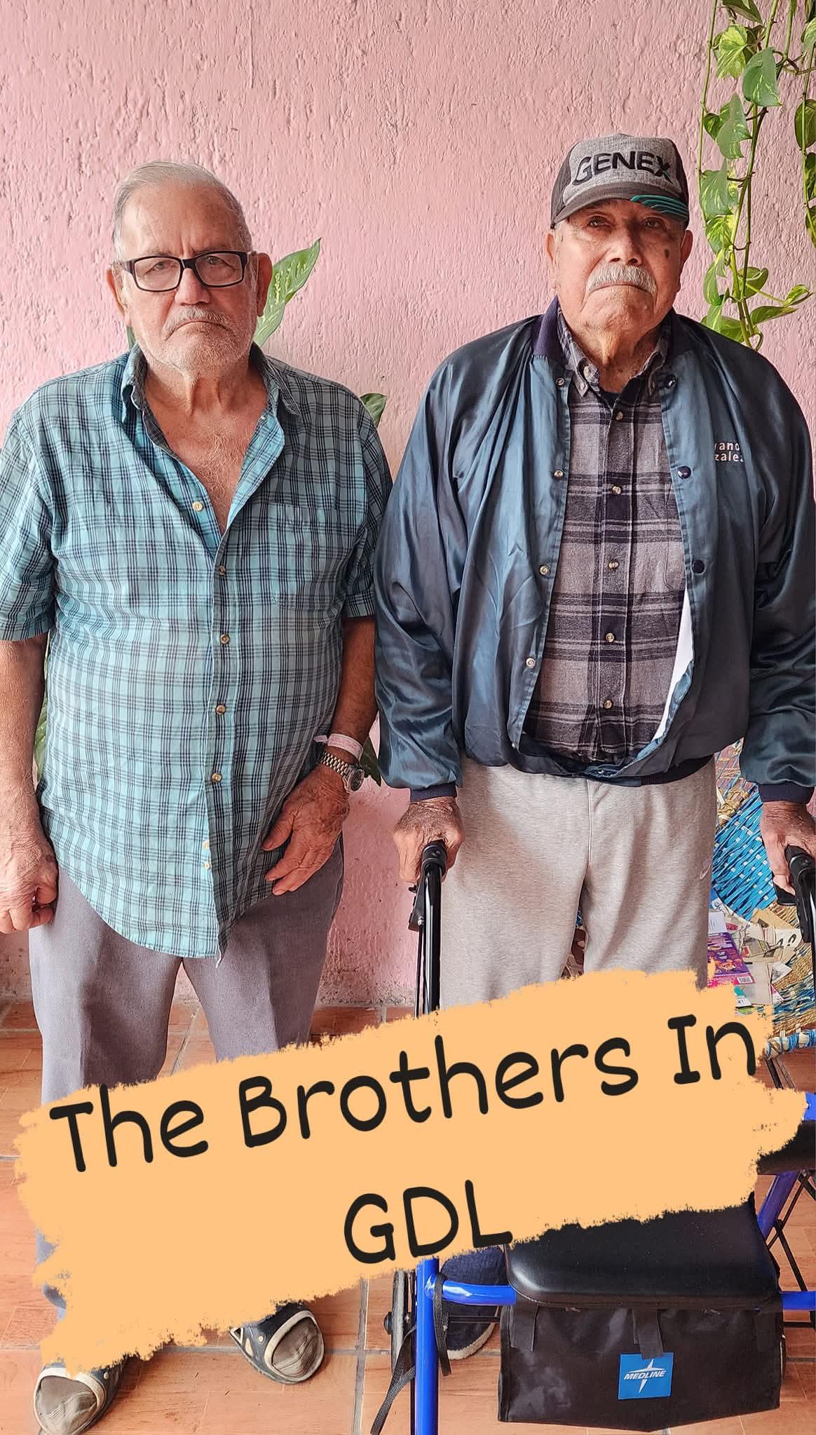 Two men standing next to each other