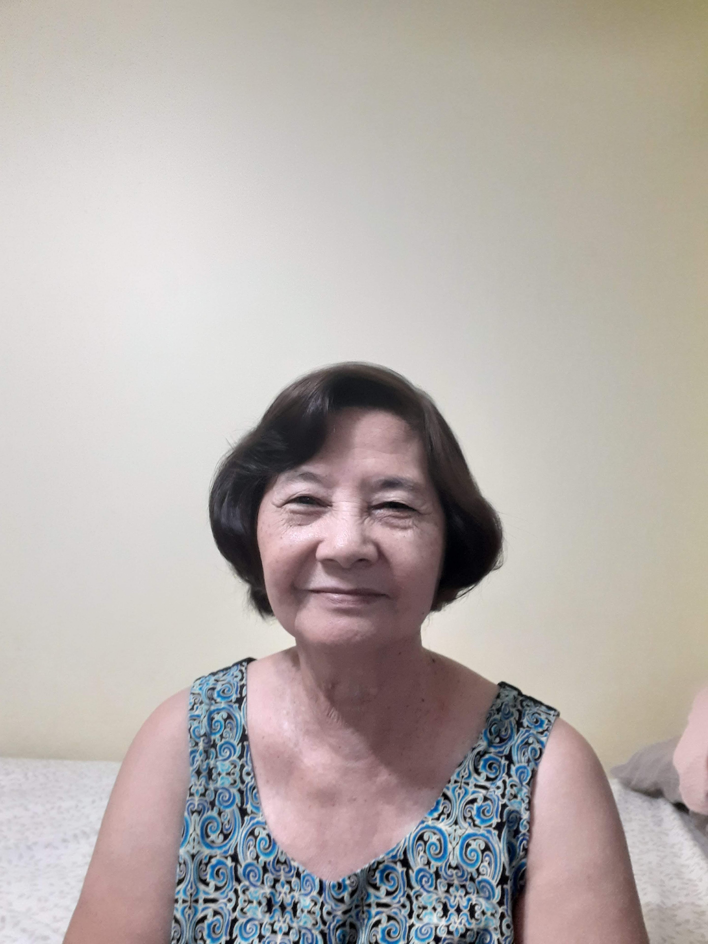 A woman smiling at the camera