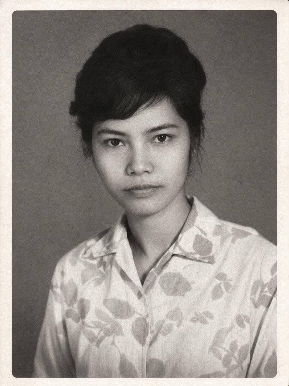 A woman with a short hair bun