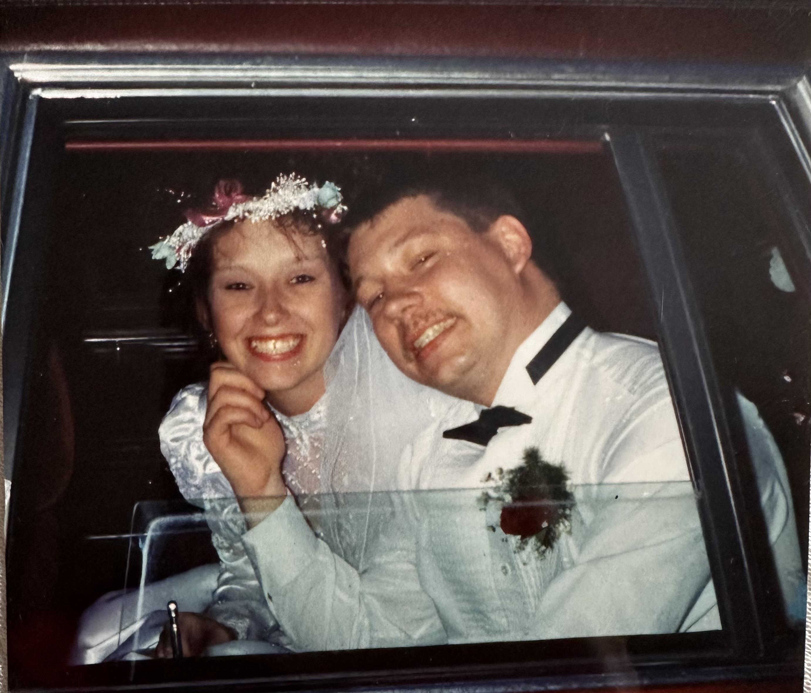 A man and woman in a car