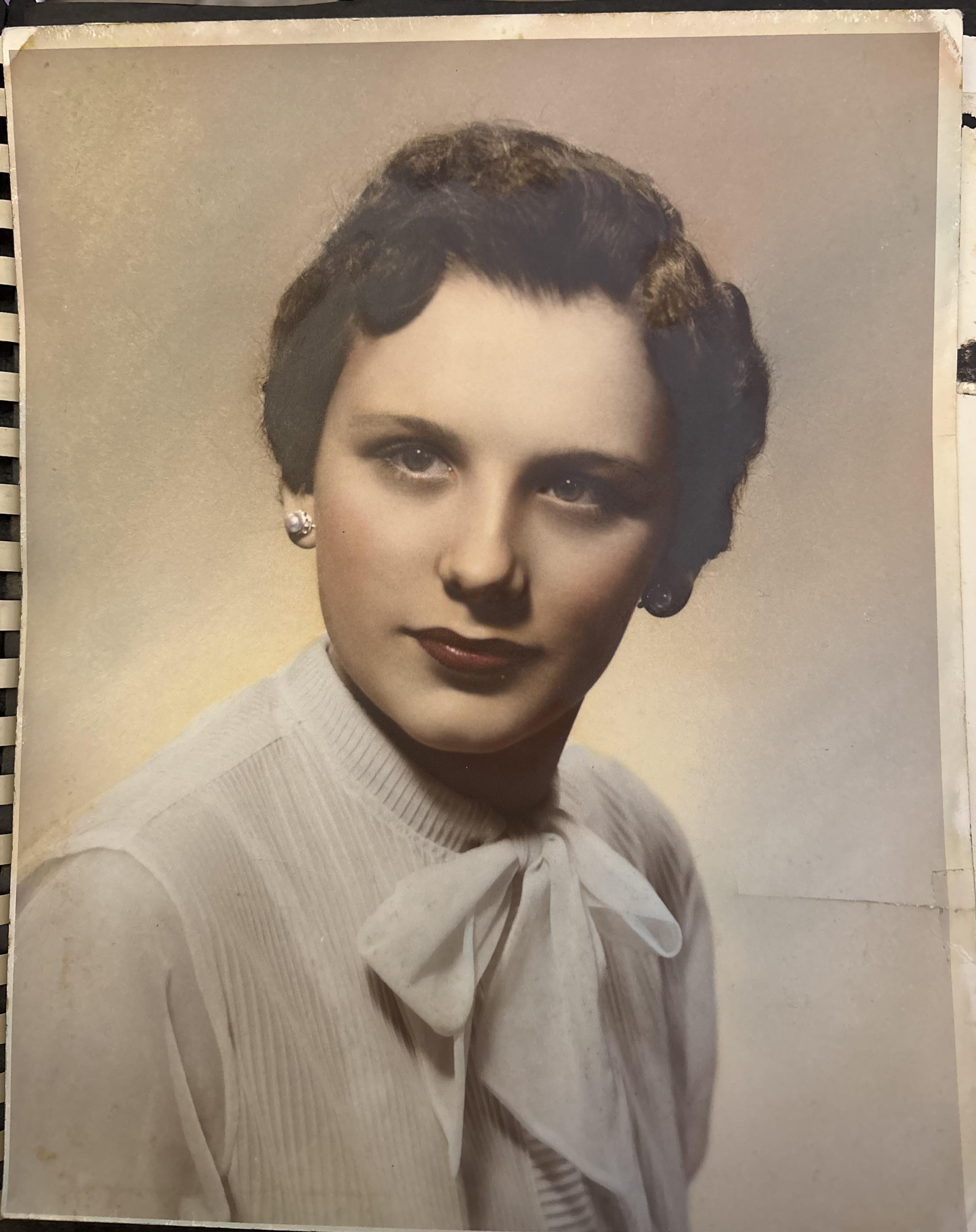 A woman in a white shirt