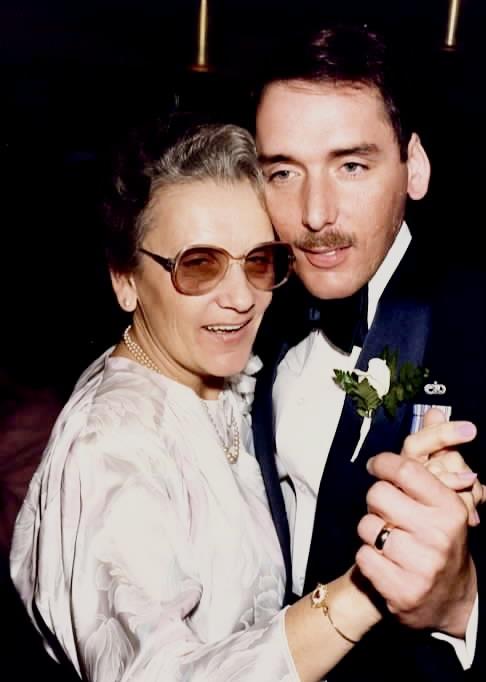 A man and woman posing for a picture