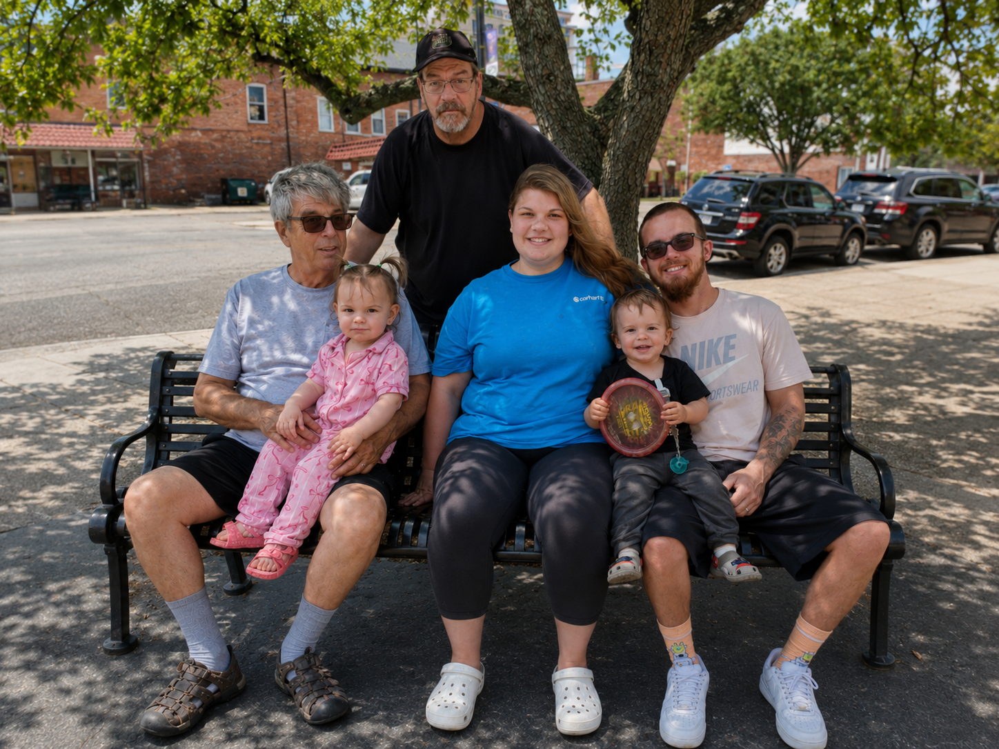 A group of people sitting on a bench