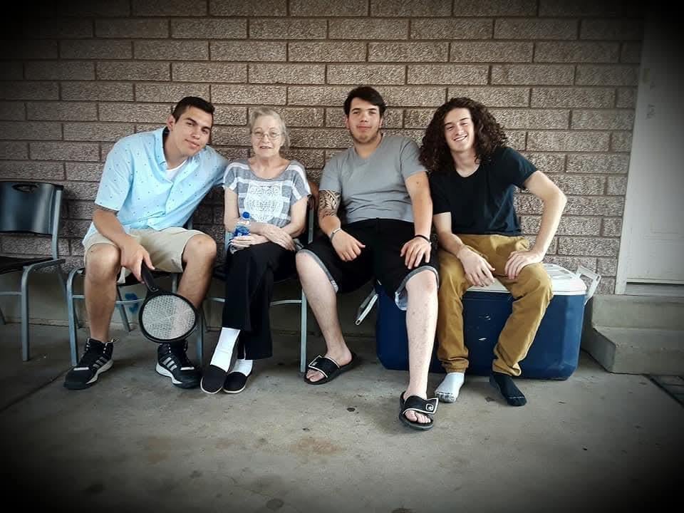 A group of people sitting on chairs