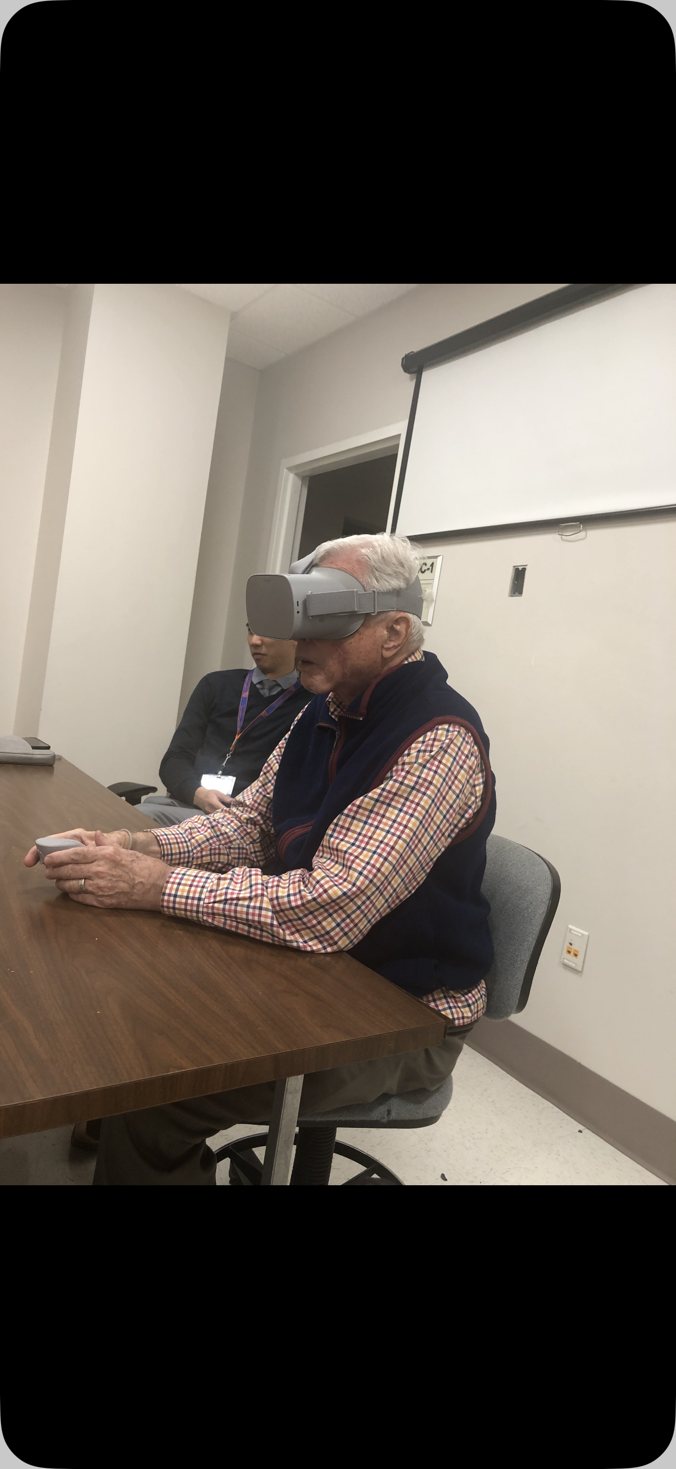 A man wearing a virtual reality goggles