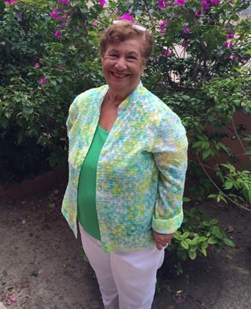 A woman smiling at the camera